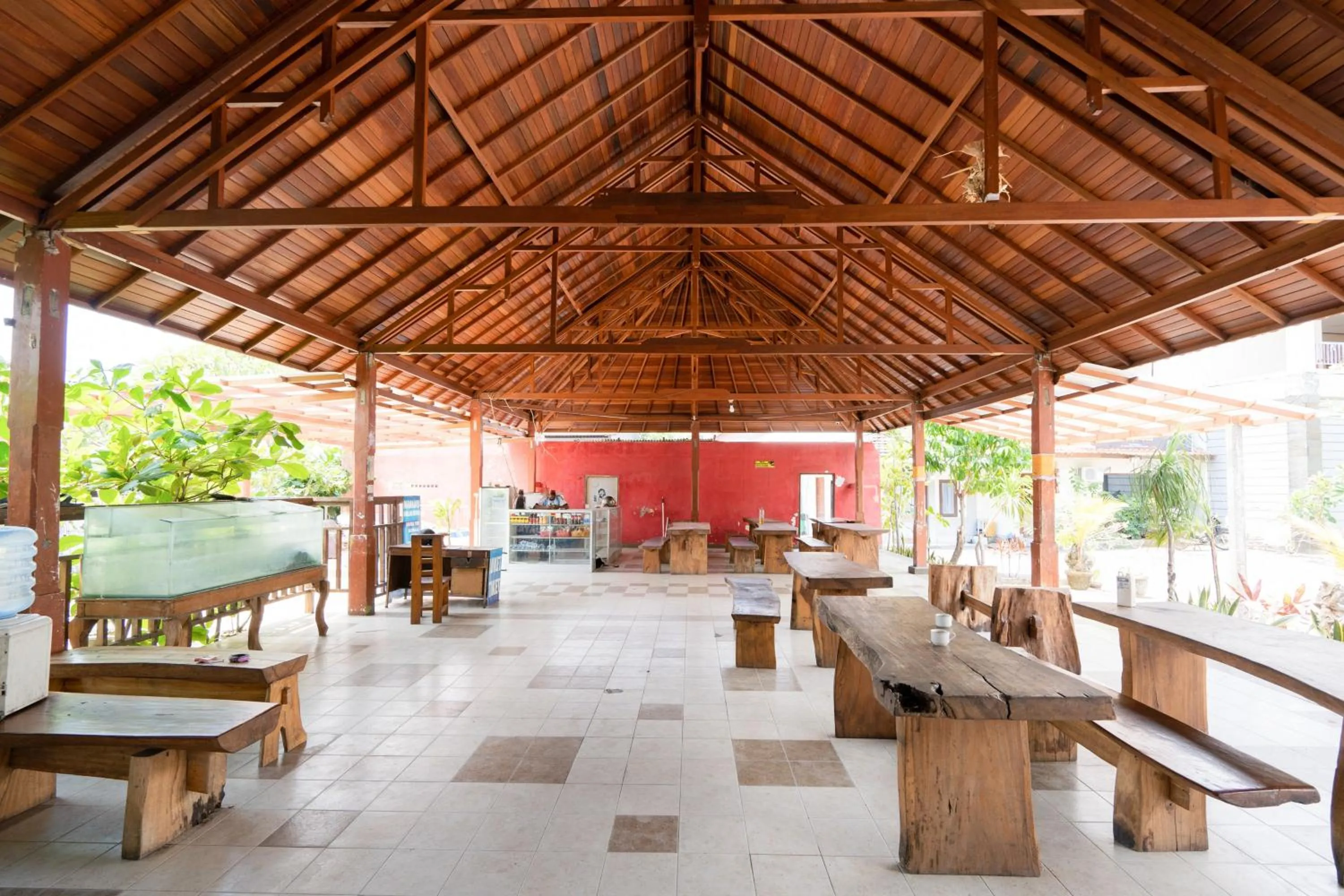 Seating area in RedDoorz Plus at Mahajaya Hotel Denpasar