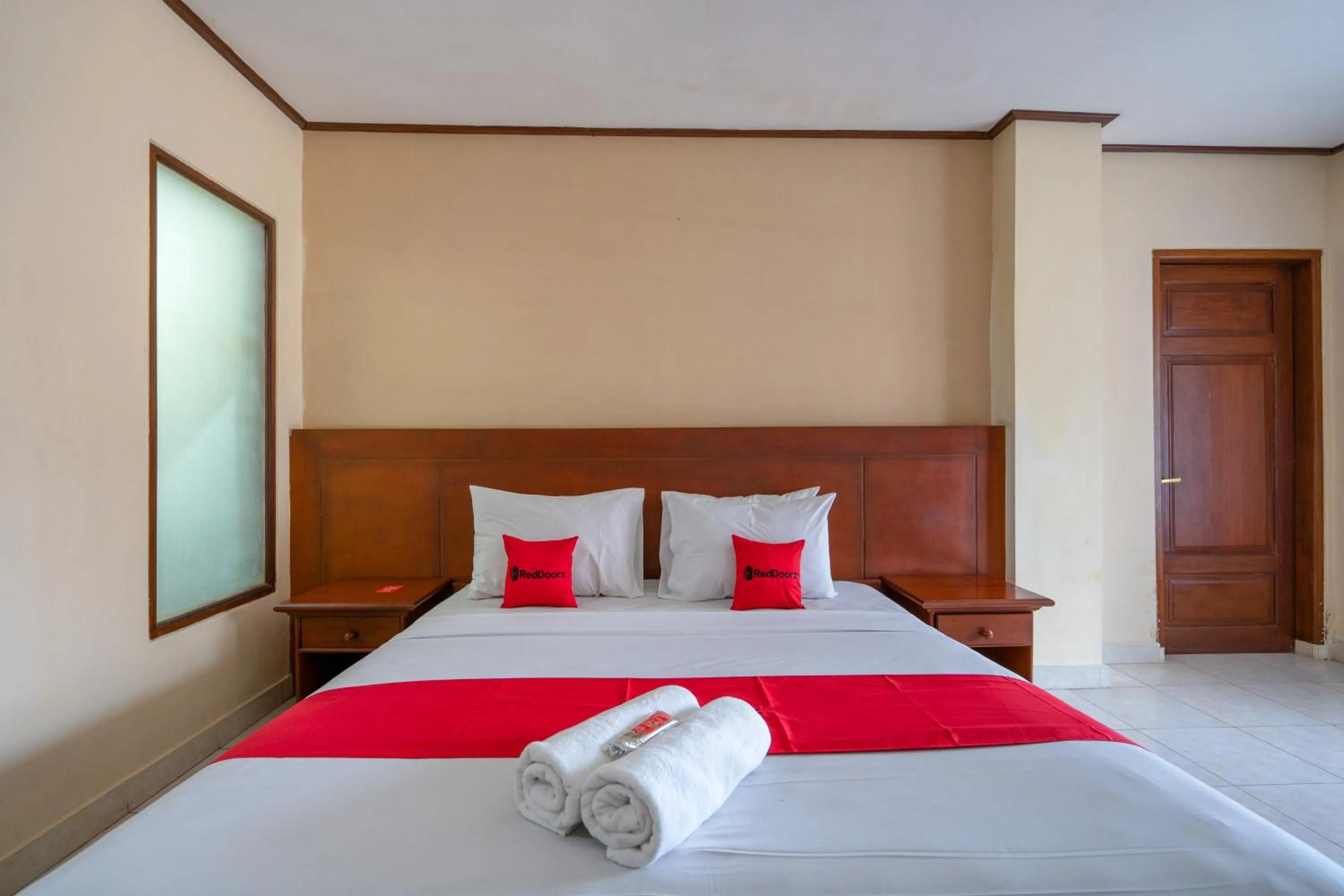 Bedroom in RedDoorz Plus at Mahajaya Hotel Denpasar