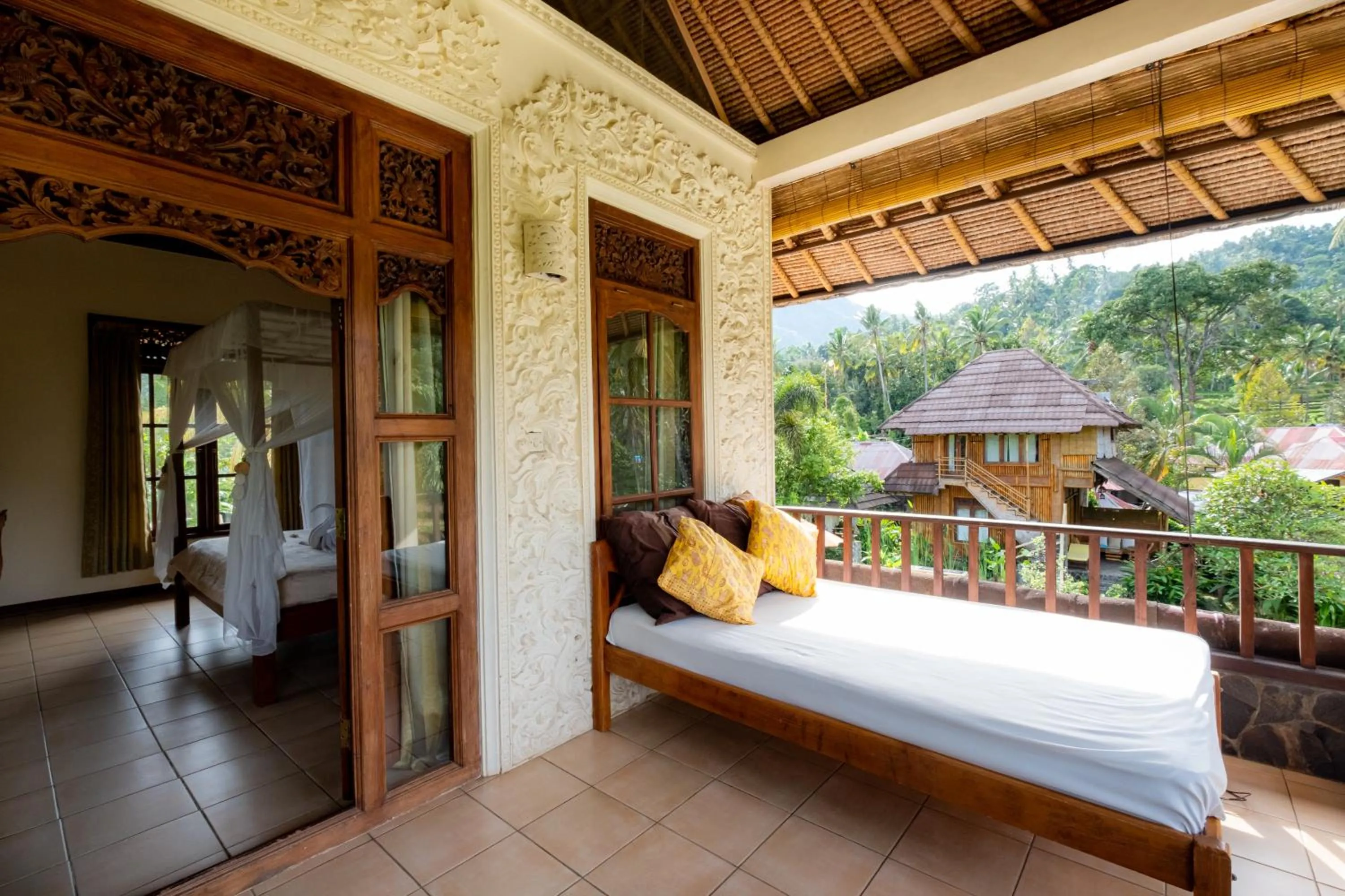 View (from property/room), Bed in Villa Manuk