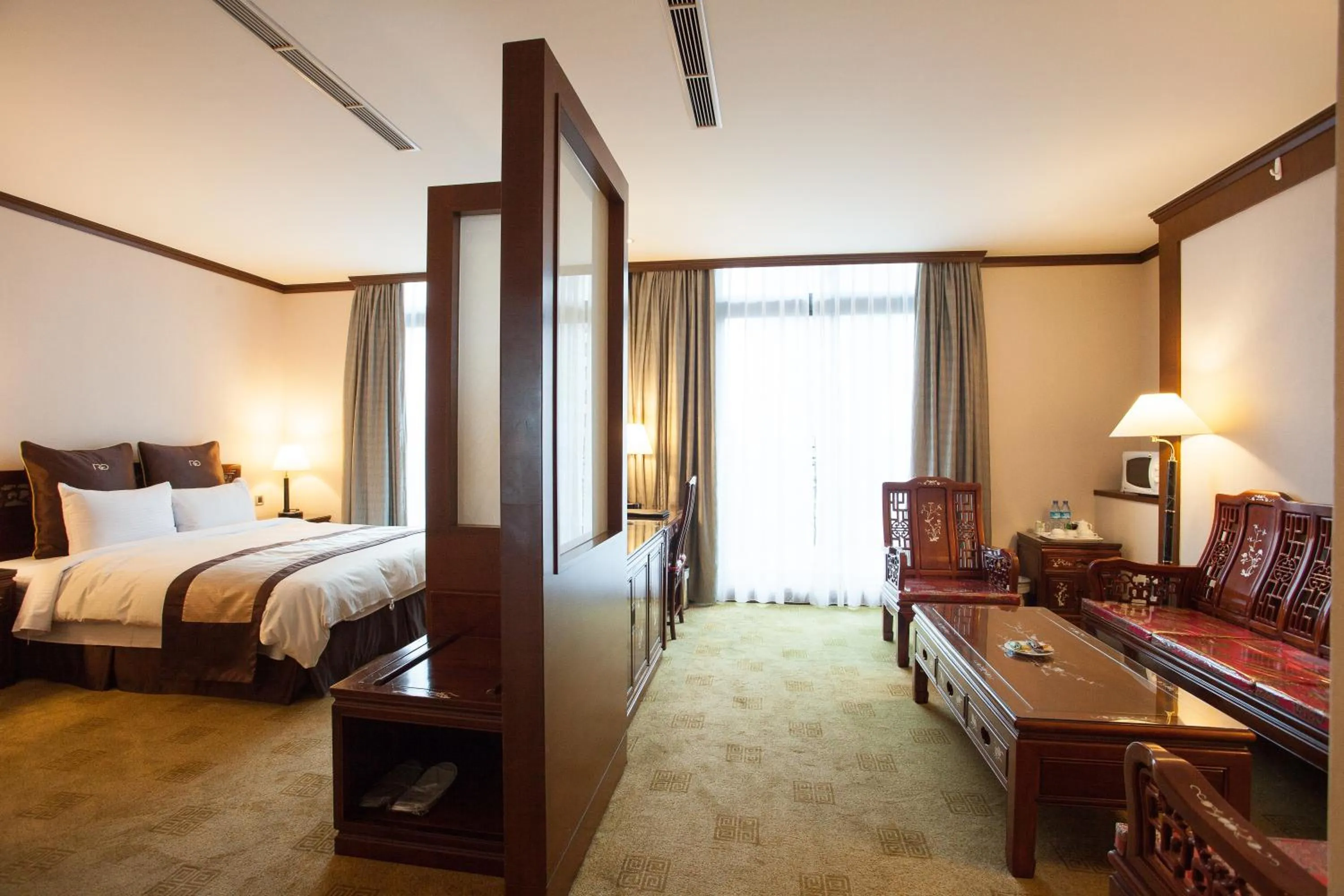 Photo of the whole room, Bed in Rich Garden Hotel