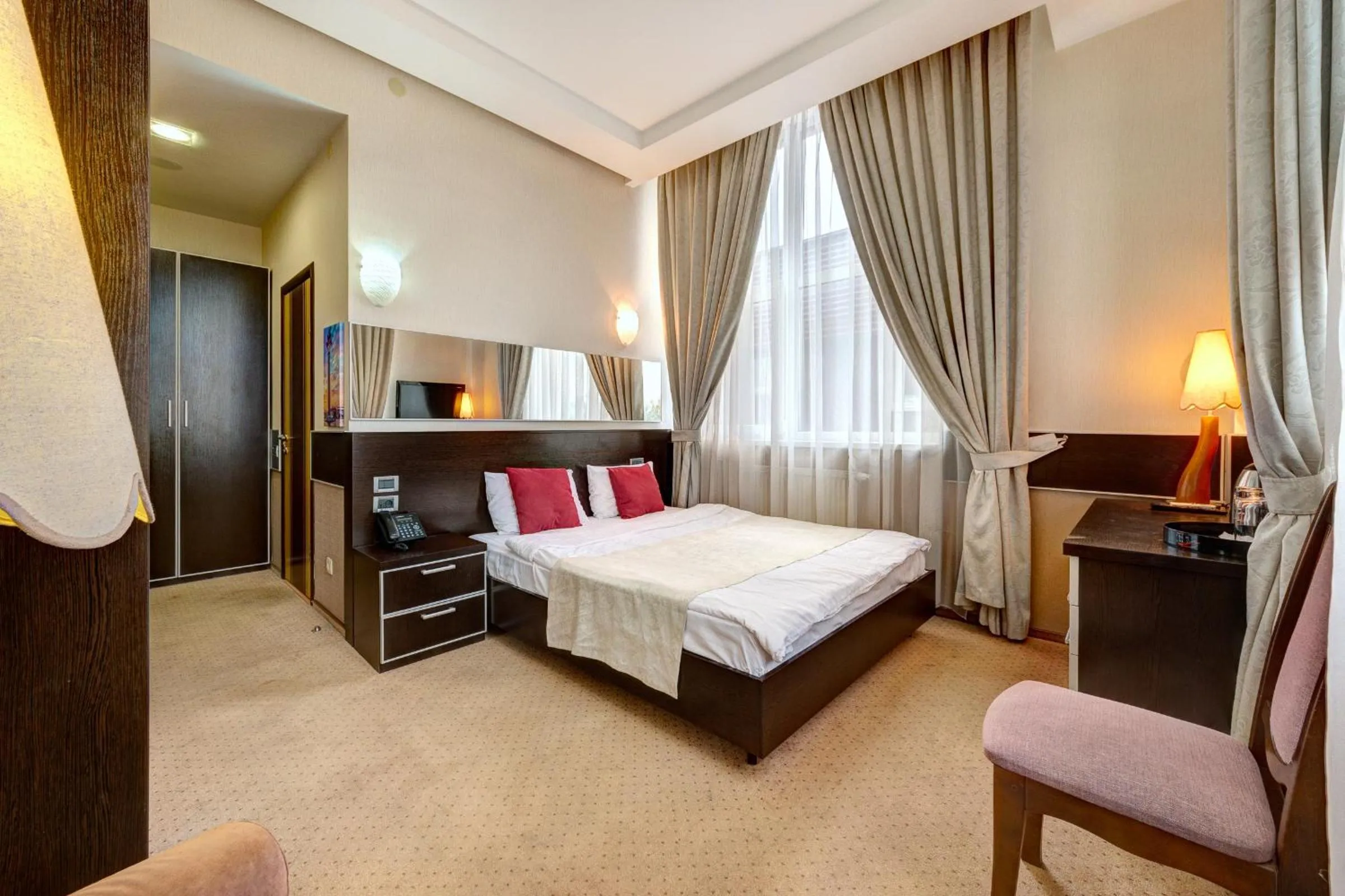 Bed in Terra Nova Sport&Spa Hotel