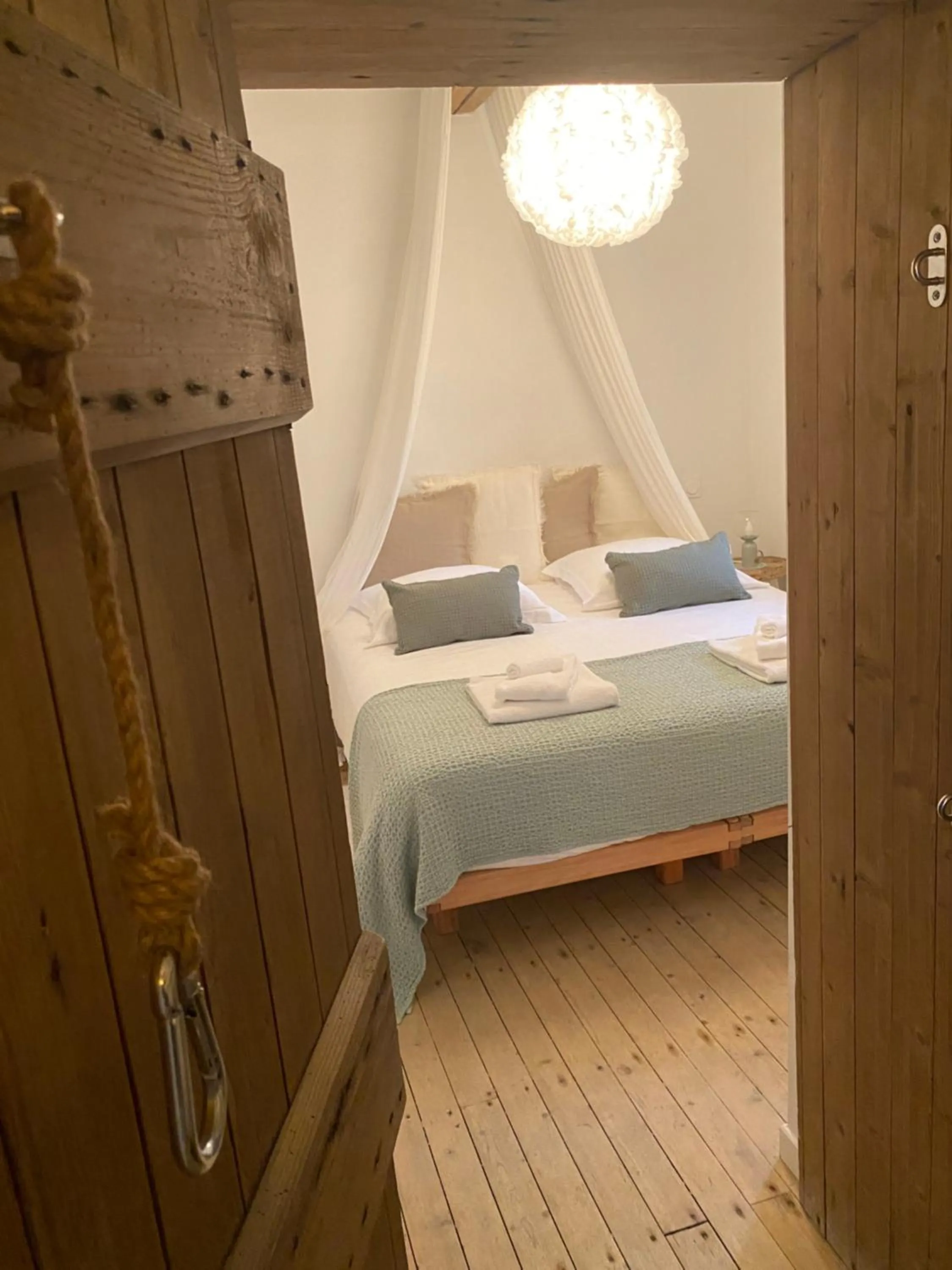 Bed in Au Petit Manoir