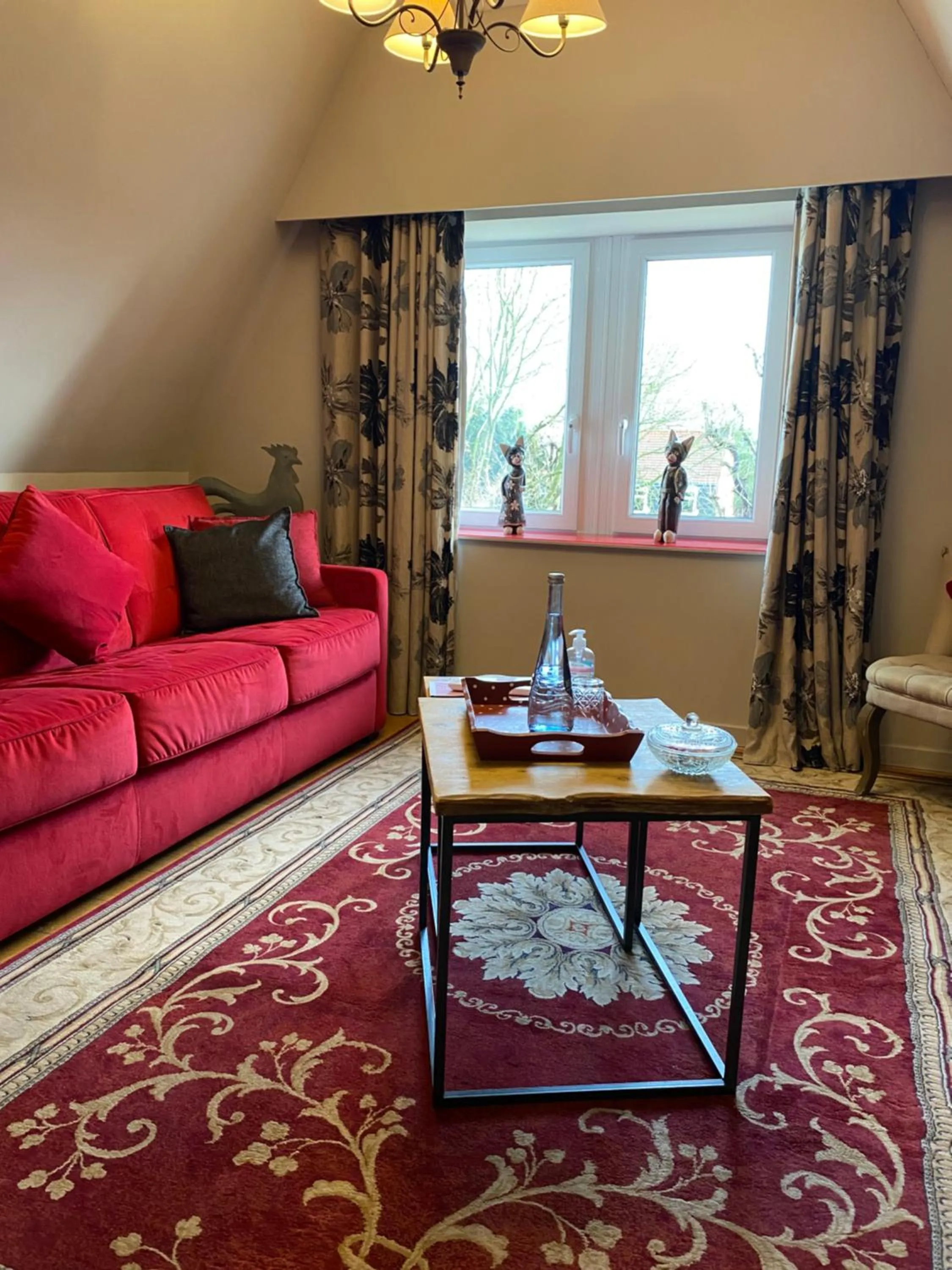 Living room in Au Petit Manoir