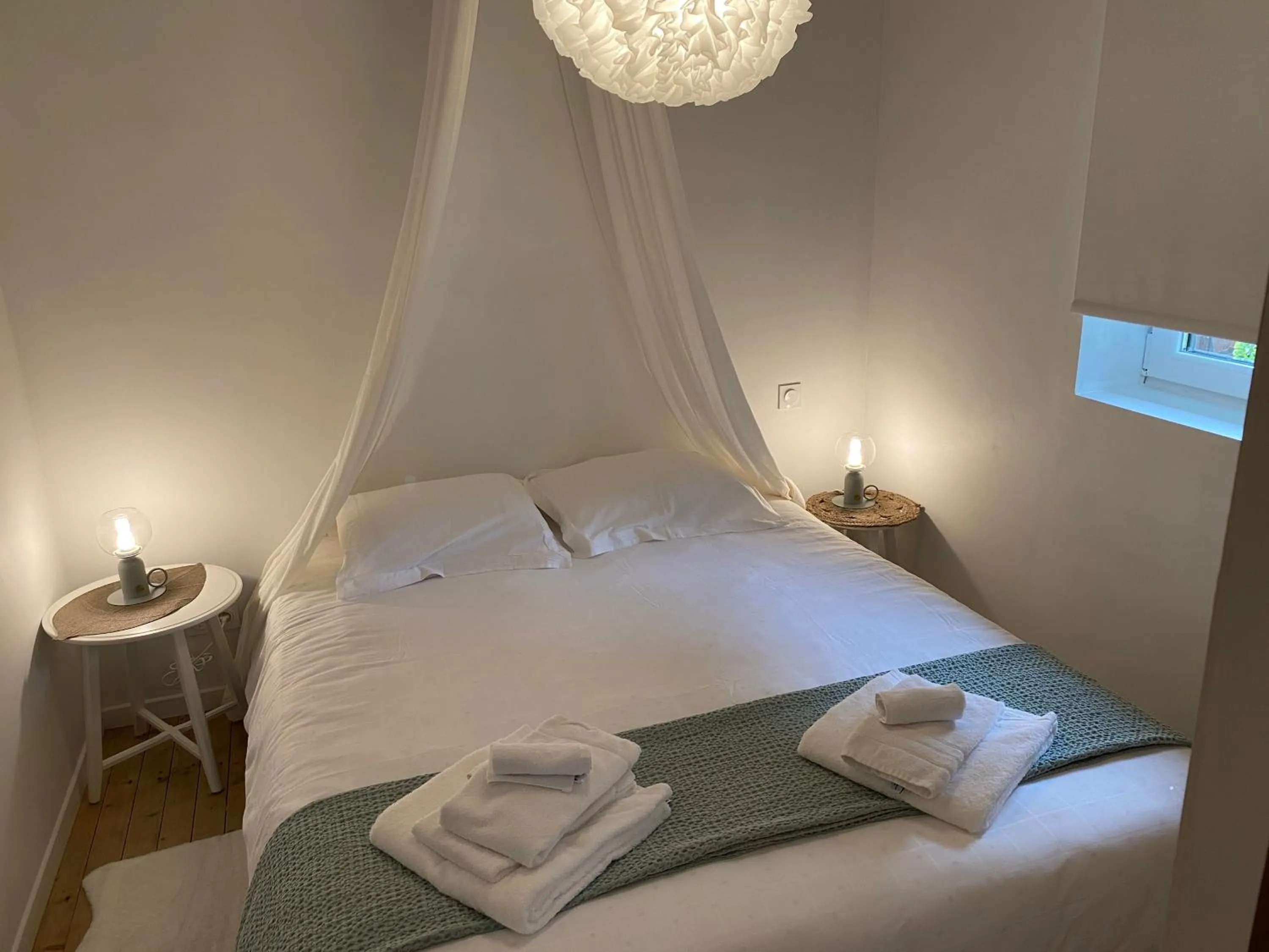 Bed in Au Petit Manoir