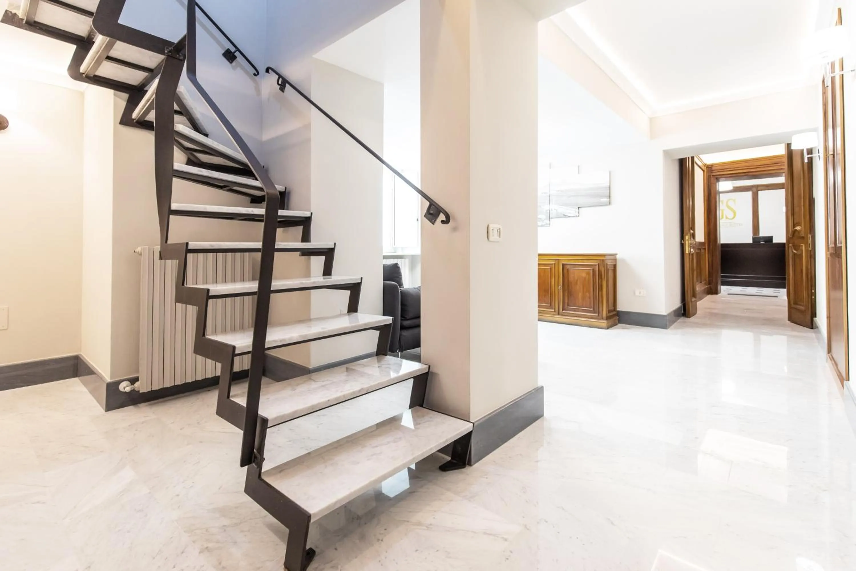 Communal lounge/ TV room in Gramsci Suites