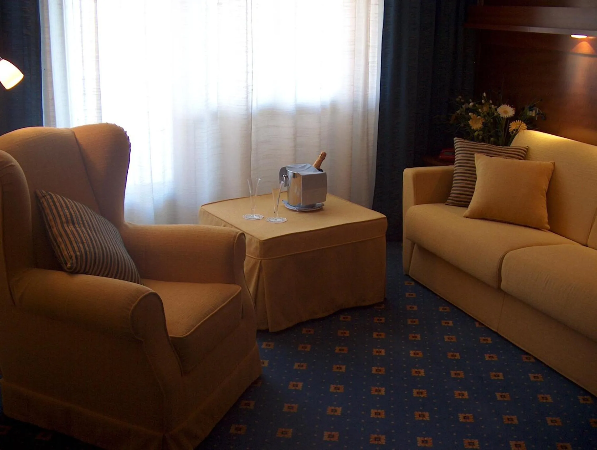 Communal lounge/ TV room in Hotel Corallo