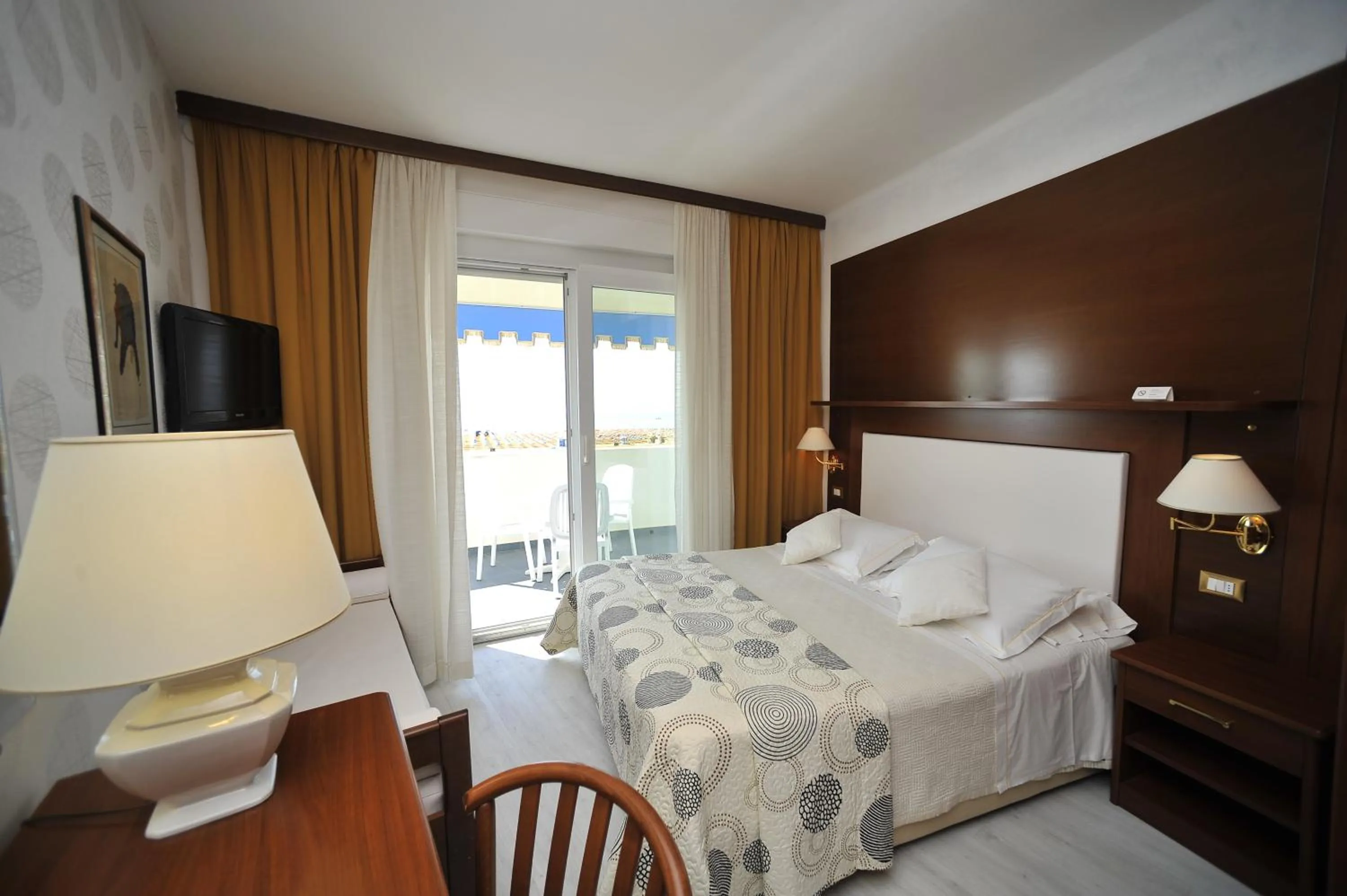 Bed in Hotel Corallo