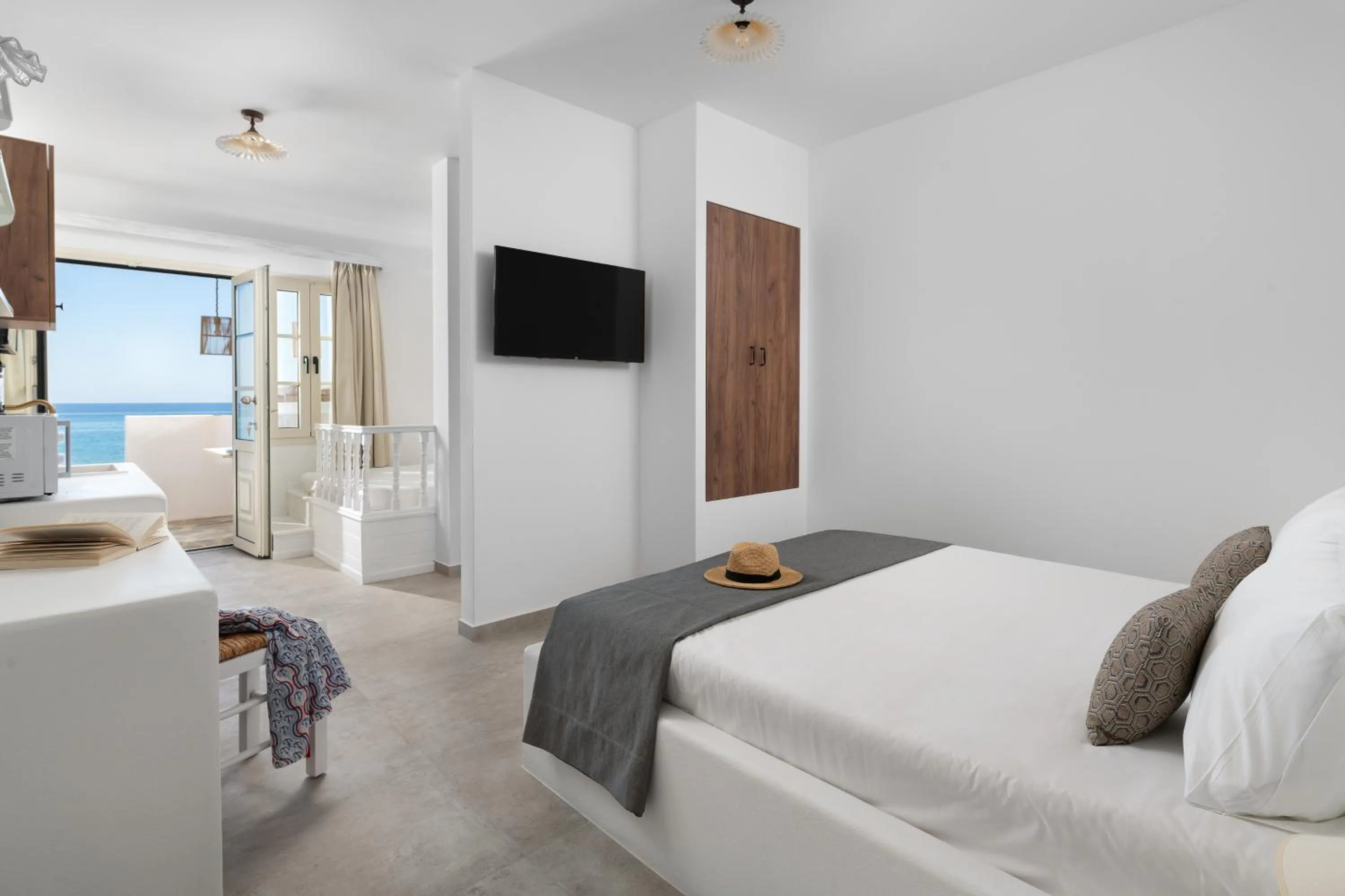 Bed in Stegna Akti Luxury Suites