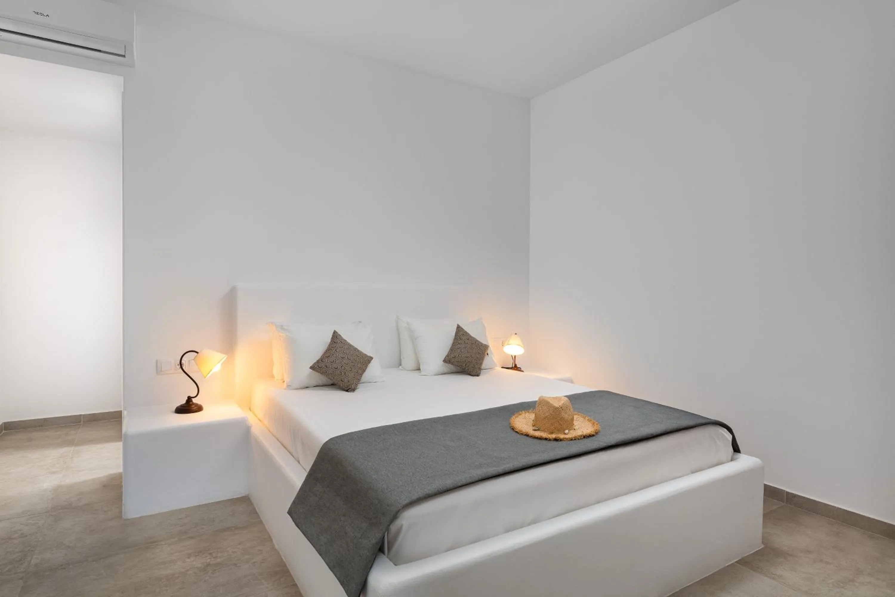 Bed in Stegna Akti Luxury Suites