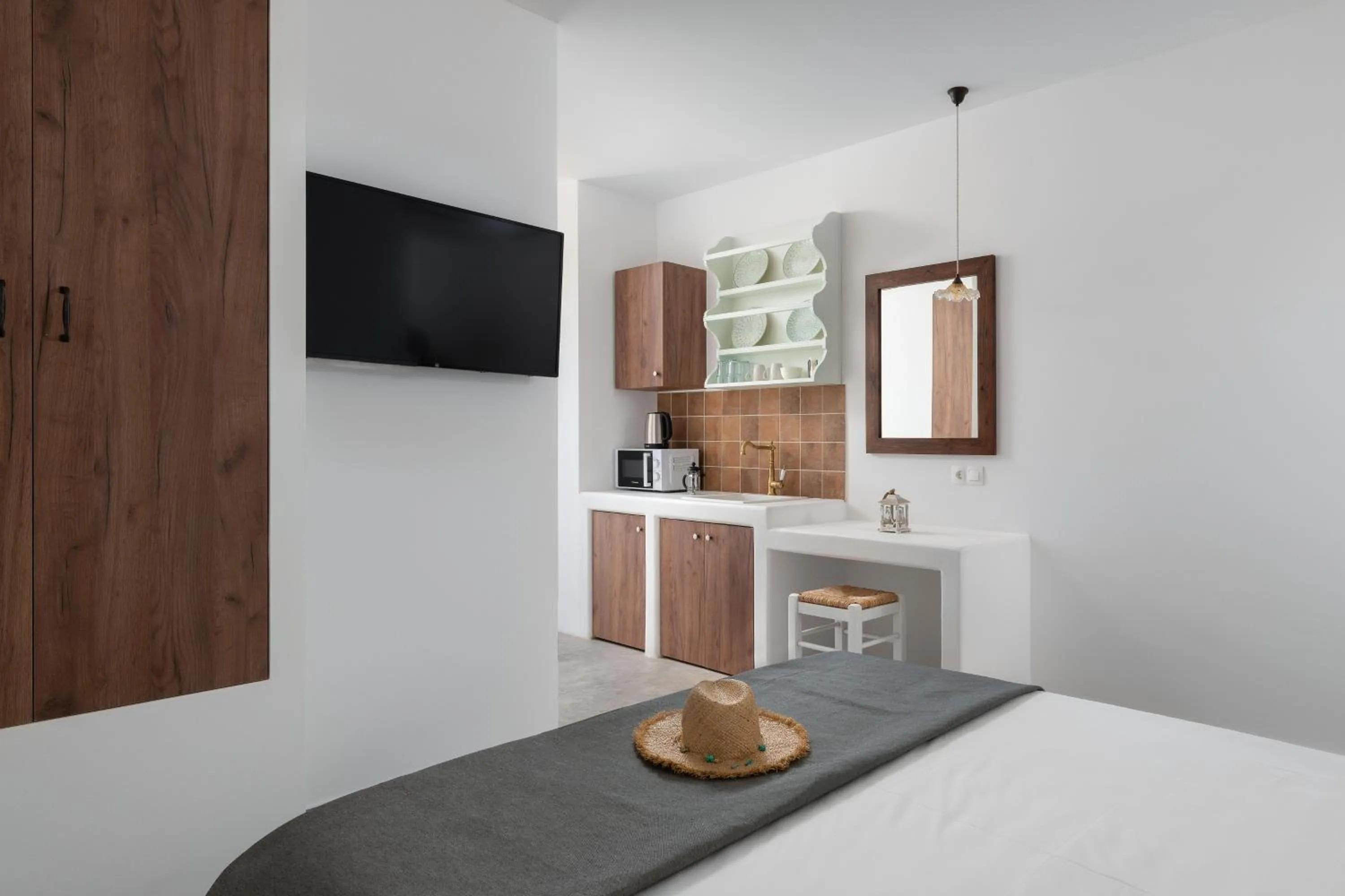 Bed in Stegna Akti Luxury Suites