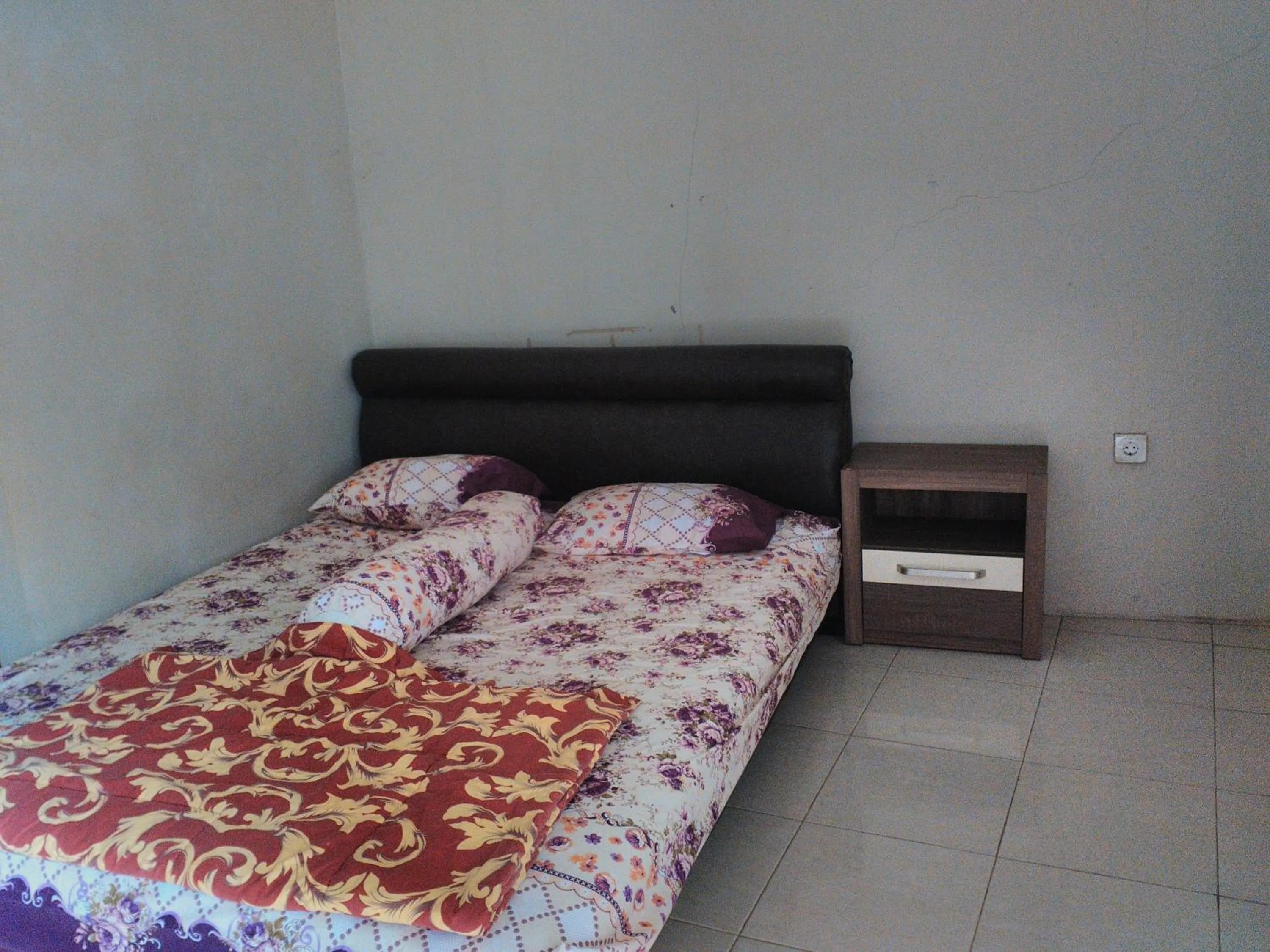 Bed in Nabila Syar'i Guest House