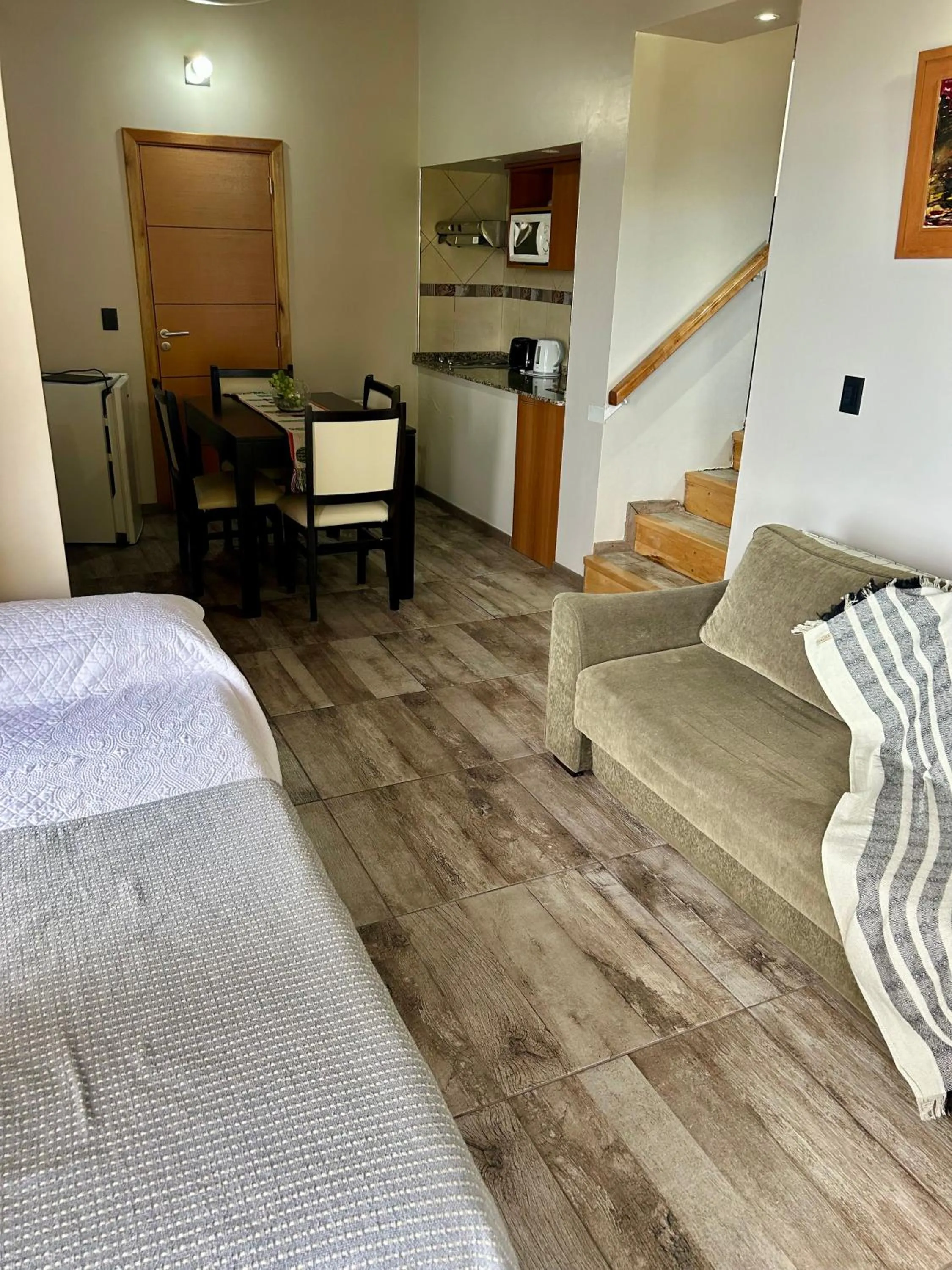 Kitchen or kitchenette, Bed in Bahia Paraiso Apart & Suites