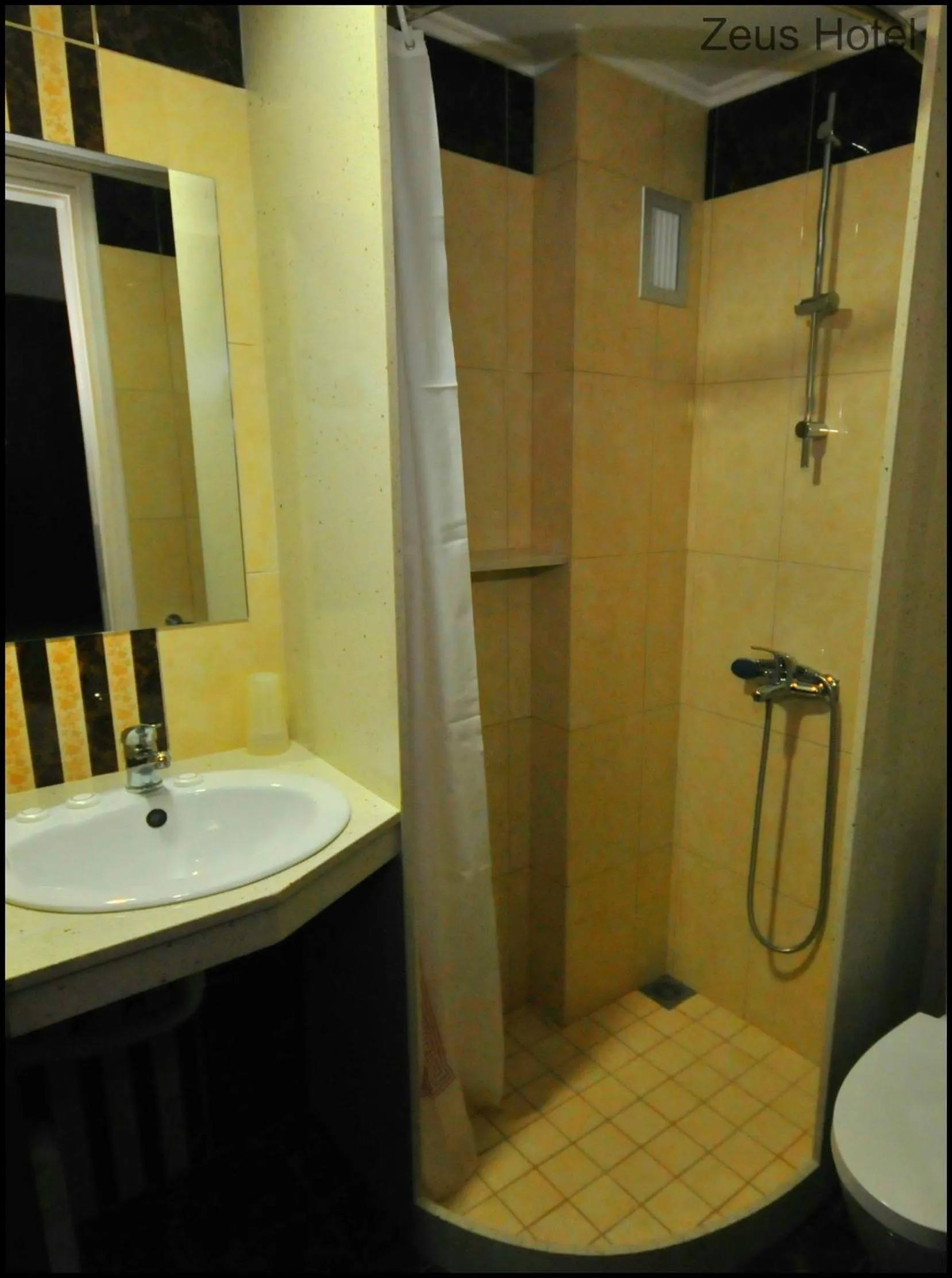 Bathroom in Zeus Hotel