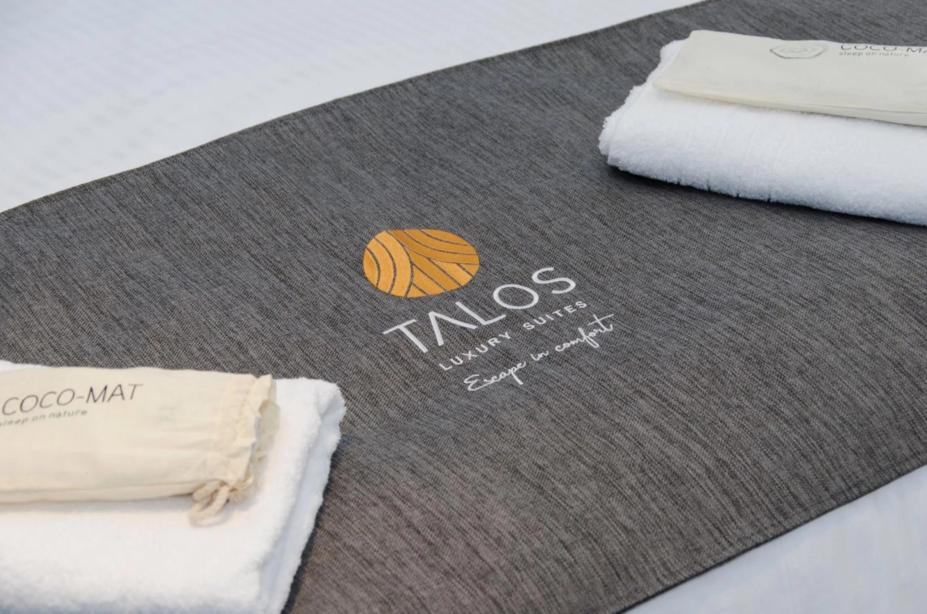 Bed in Talos Luxury Suites