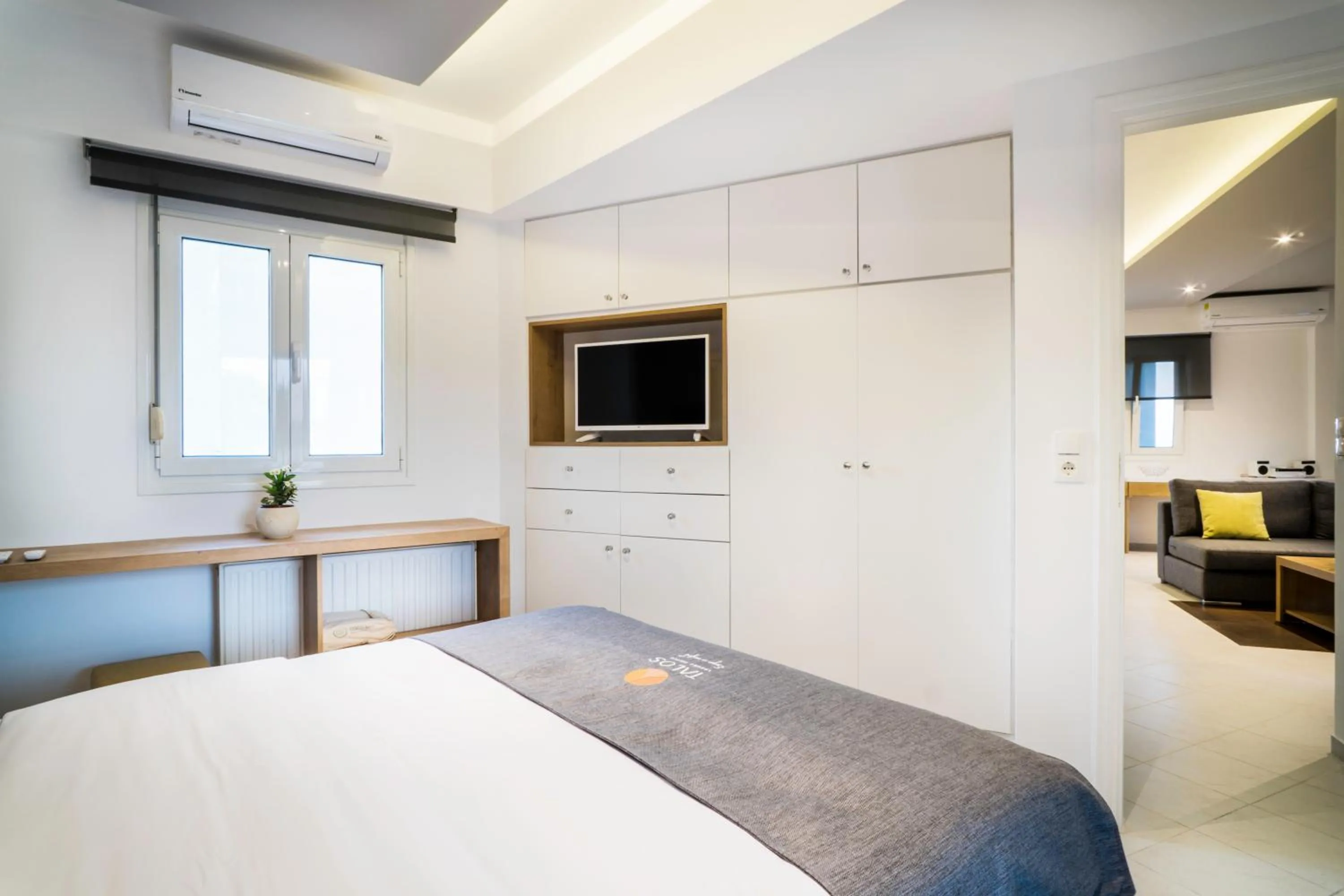 Bed in Talos Luxury Suites