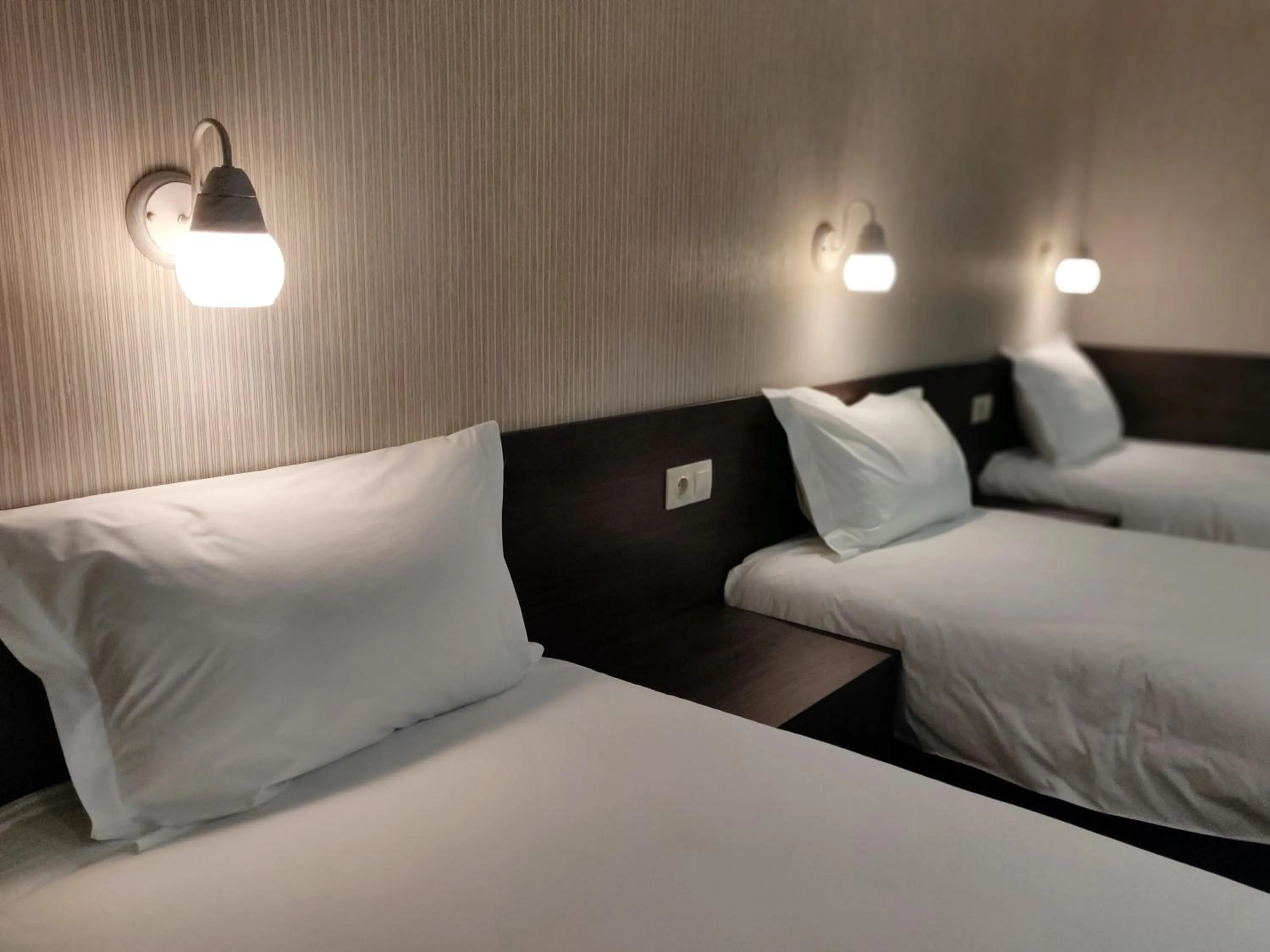 Bed in Sofievsky Posad Hotel