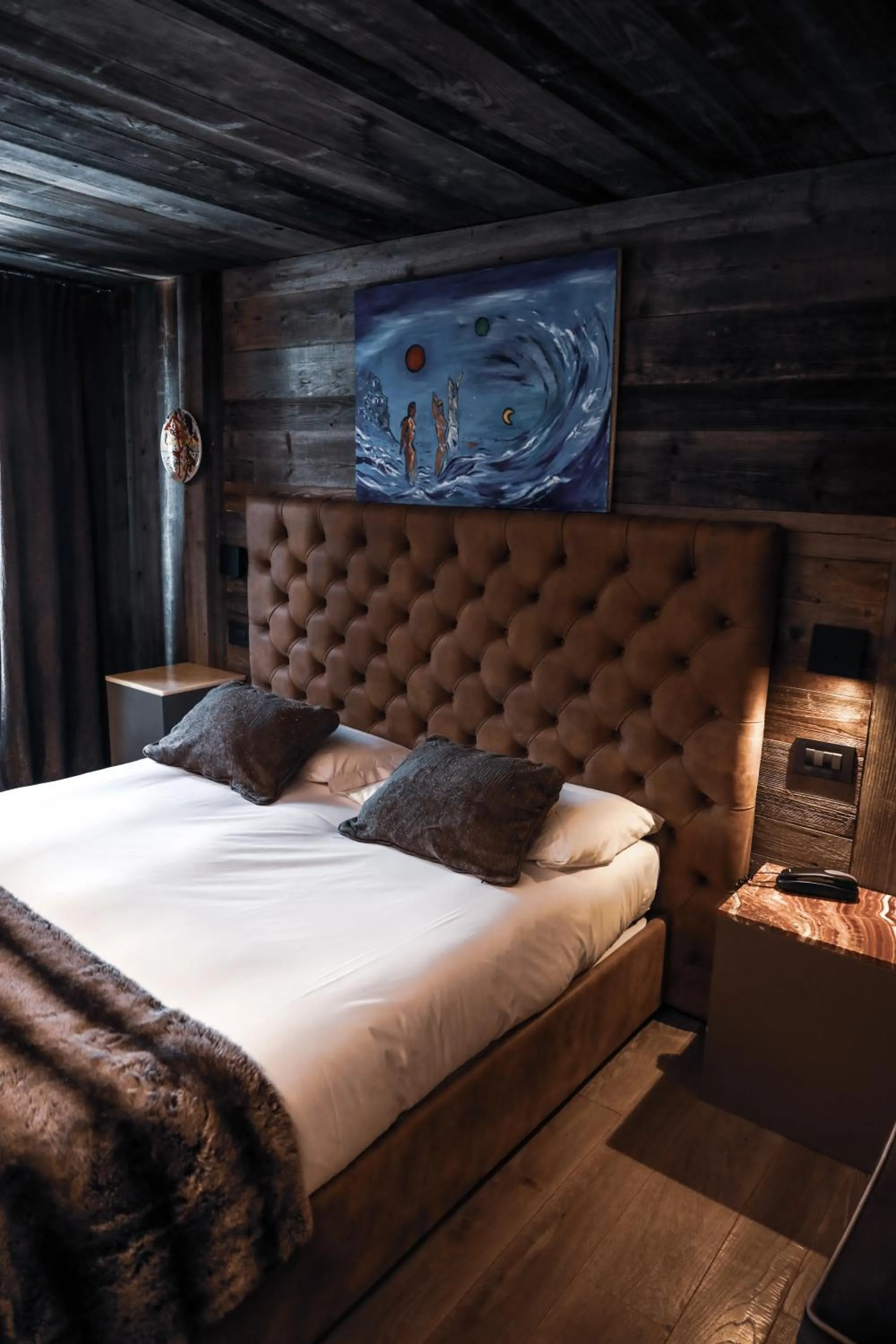 Bed in Art Hotel Grivola