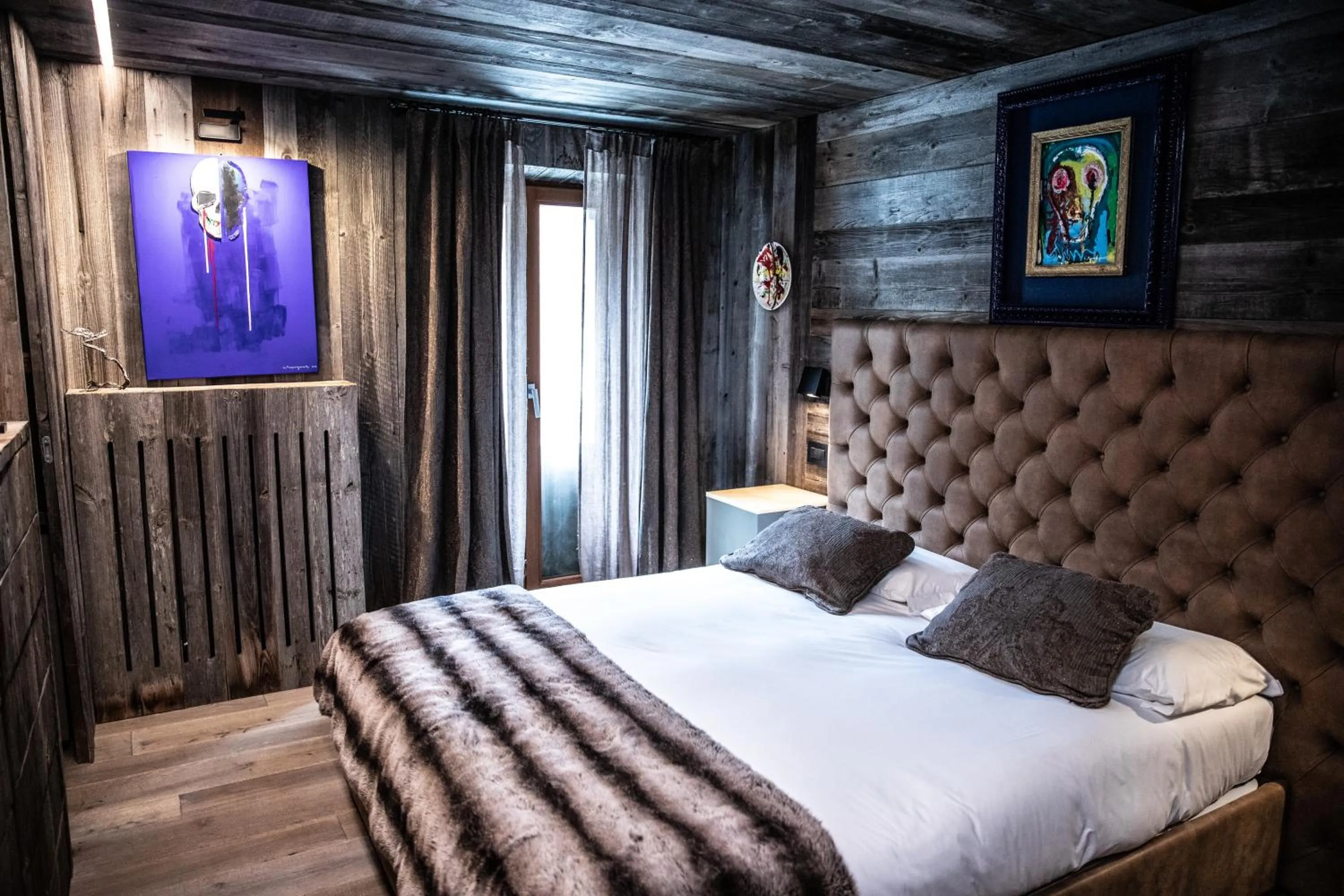 Bed in Art Hotel Grivola