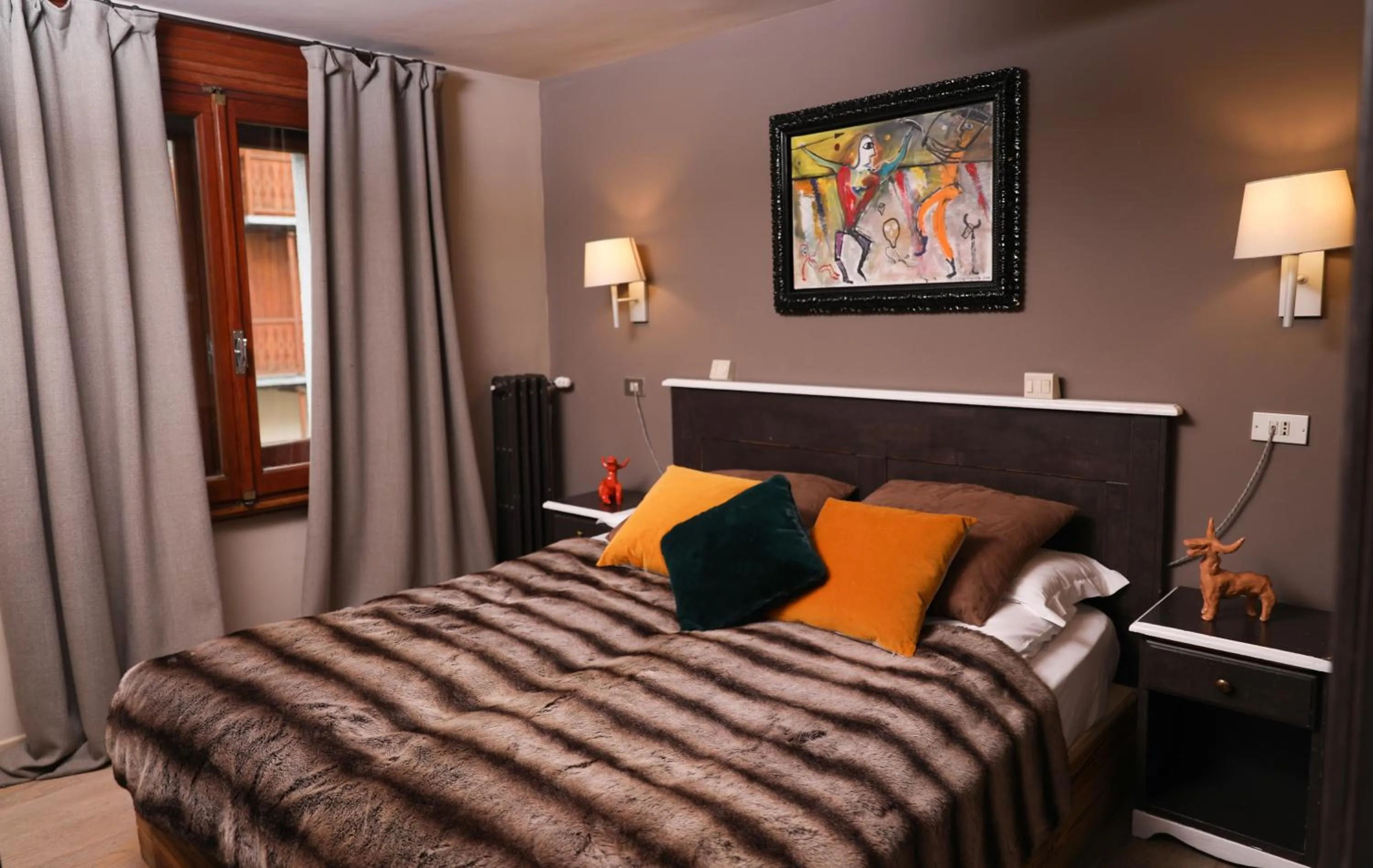 Bed in Art Hotel Grivola