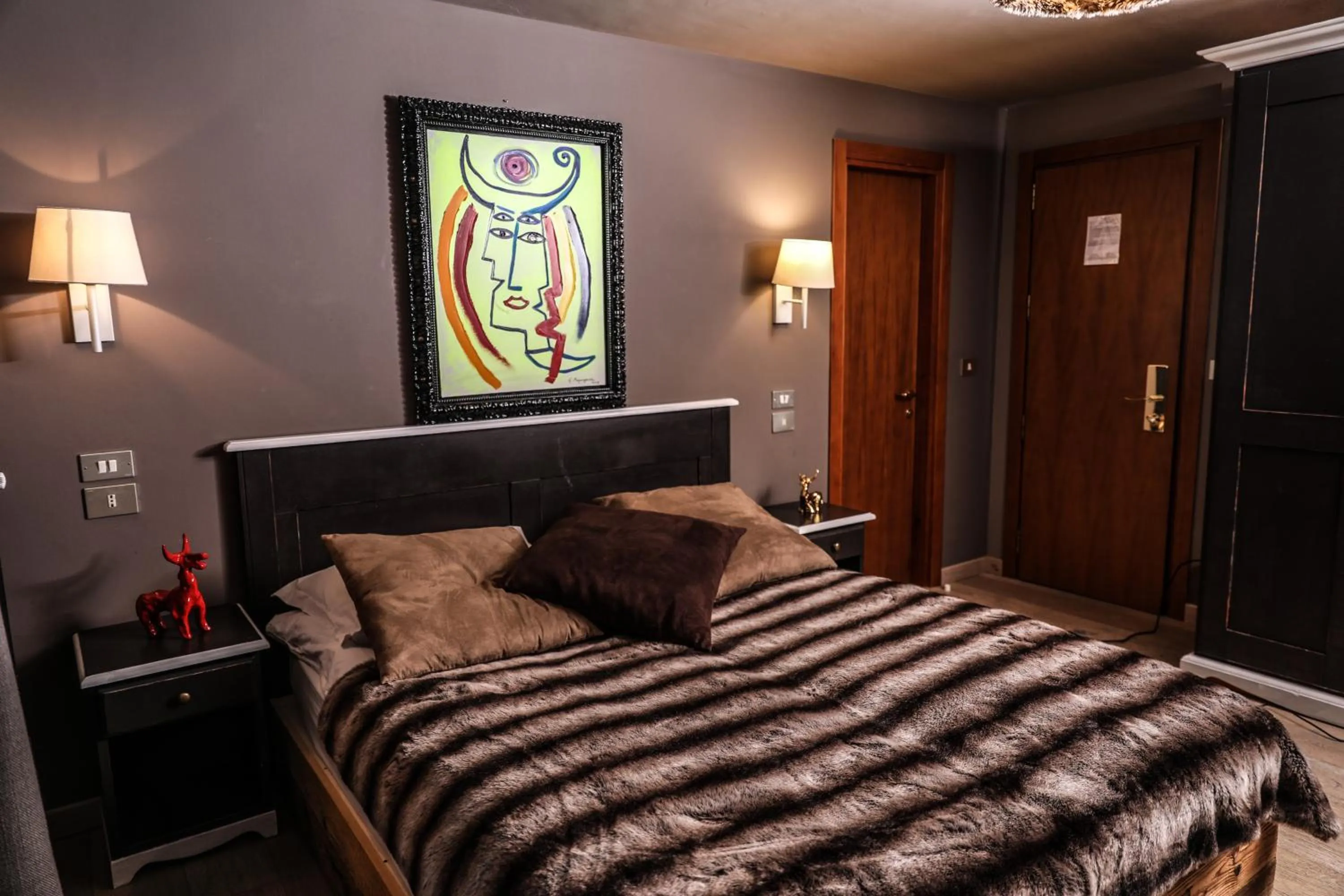 Bed in Art Hotel Grivola