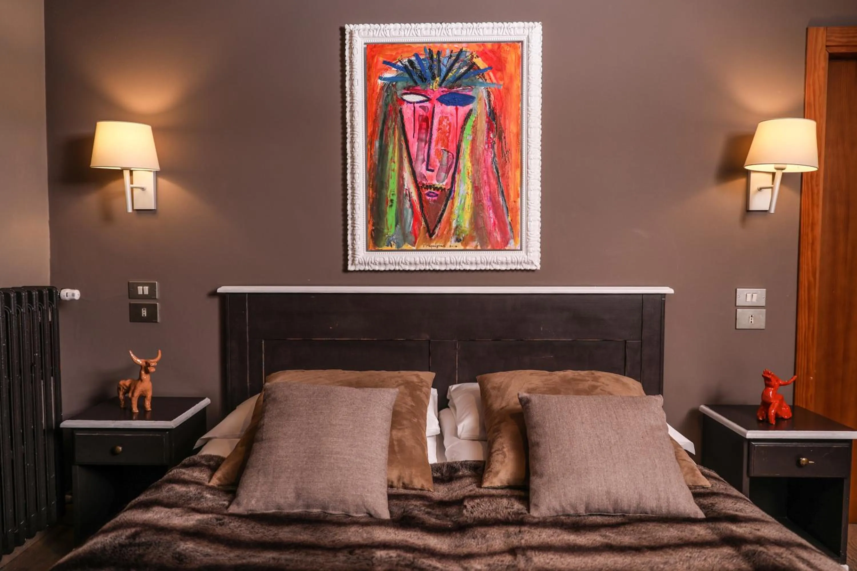 Bed in Art Hotel Grivola