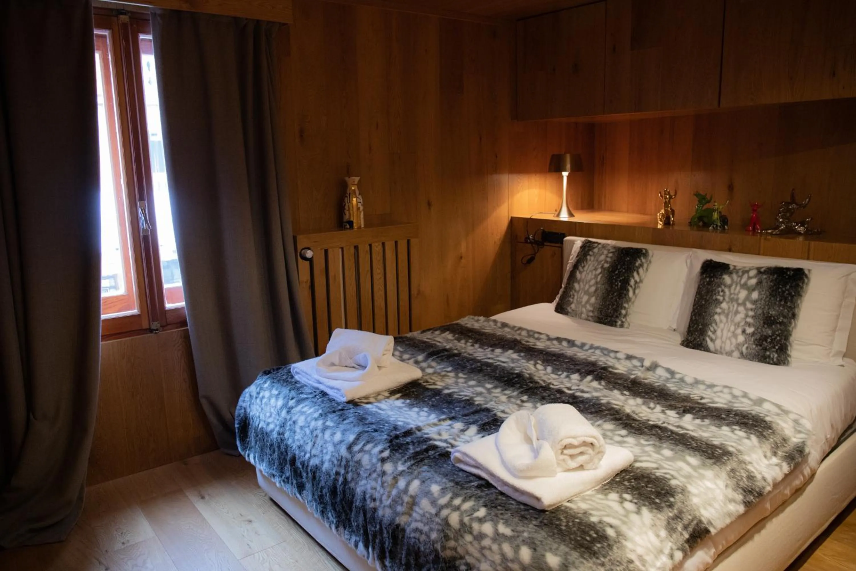 Bed in Art Hotel Grivola