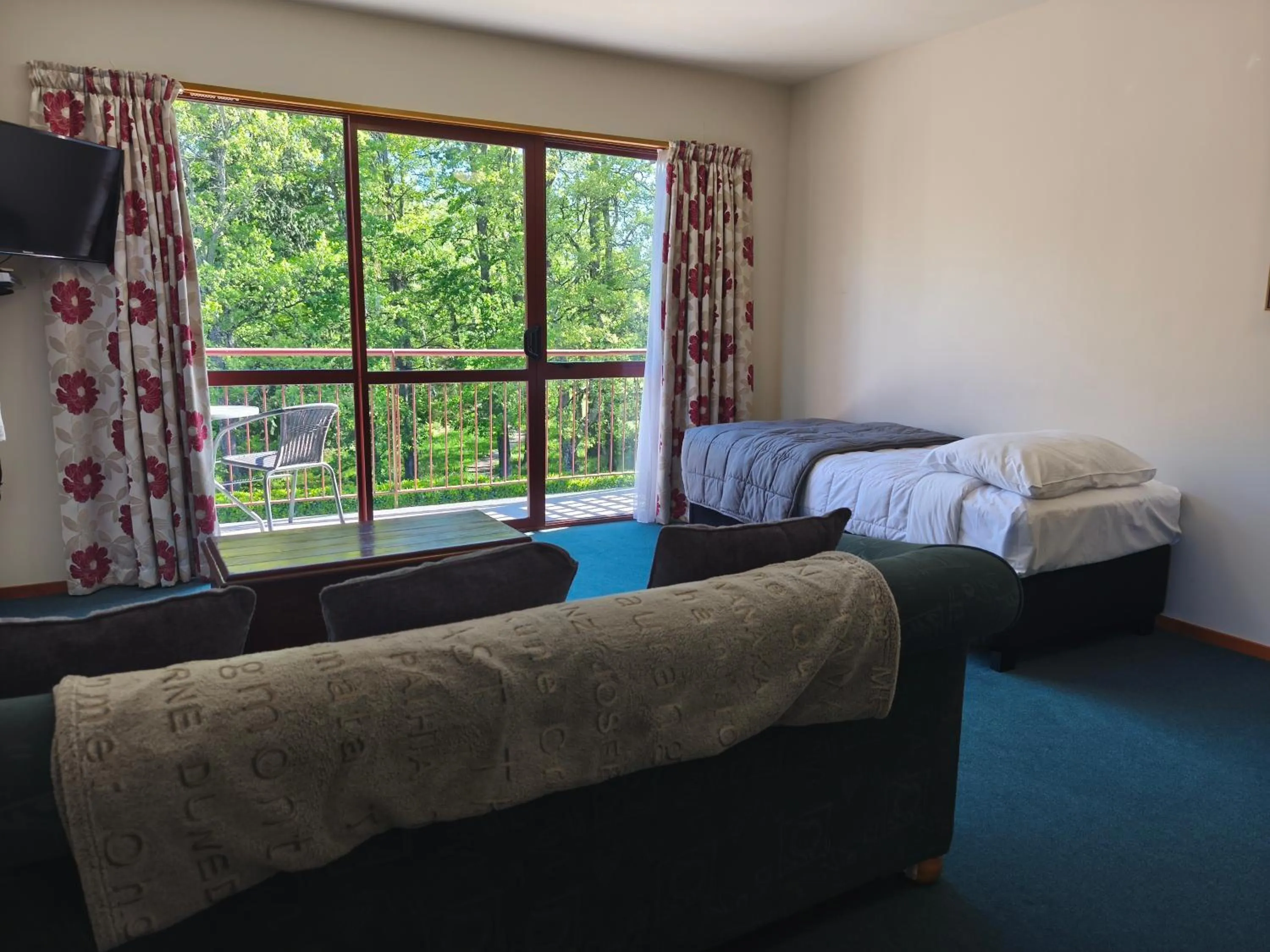 Bed in Aspen Lodge Motel