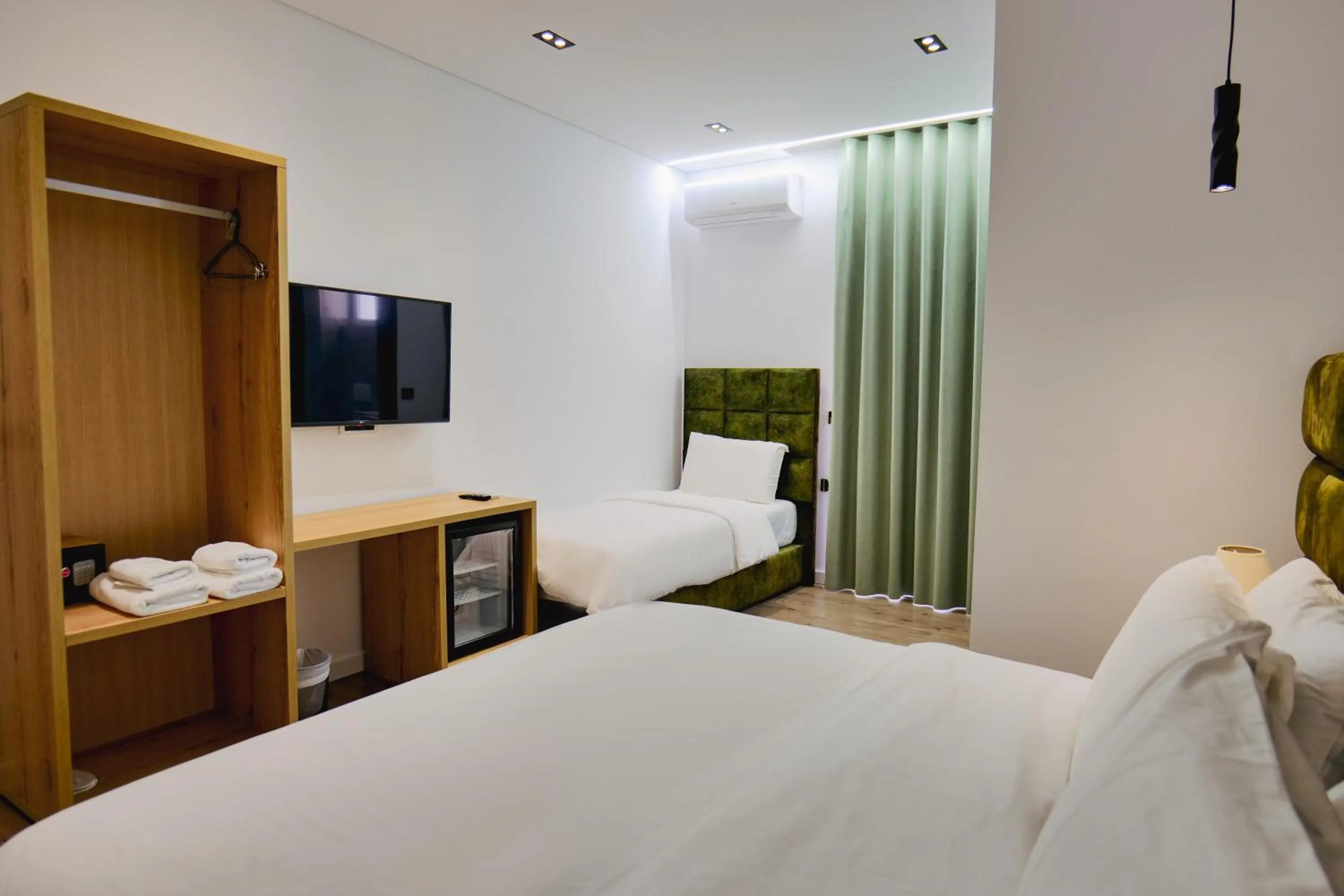 Bed in Asi Rooftop Hotel