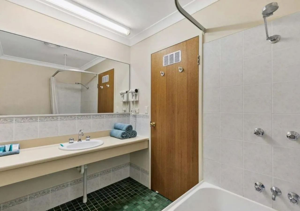 Bathroom in Blue Shades Motel