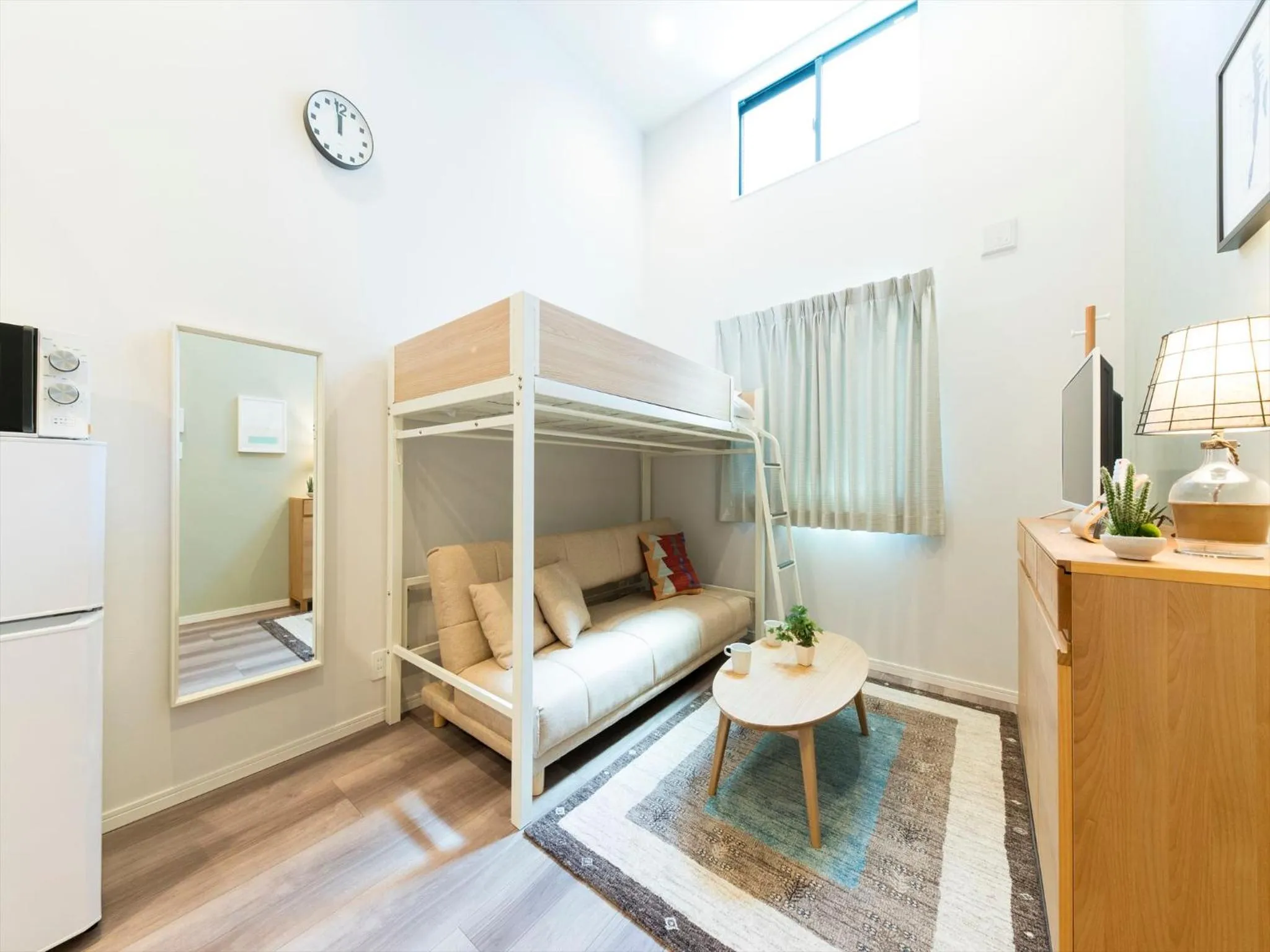 Living room, Bed in TRIP POD TOJIN-MACHI A