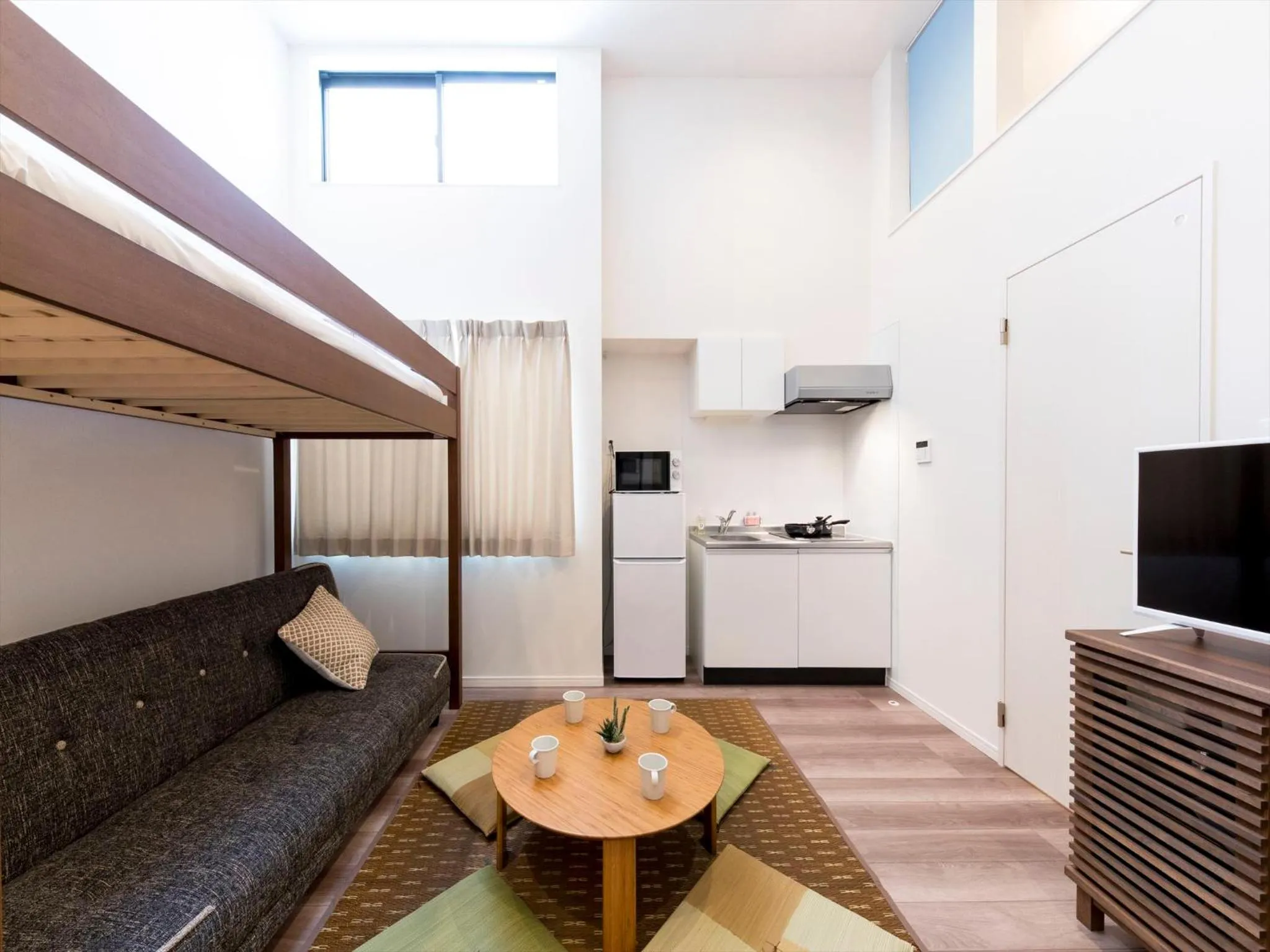 Living room in TRIP POD TOJIN-MACHI A