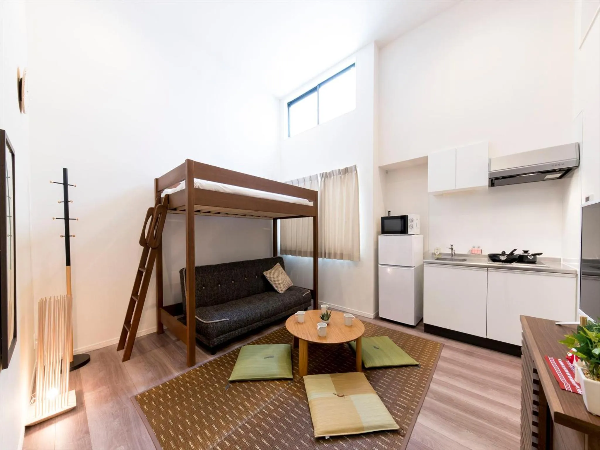 Living room, Bed in TRIP POD TOJIN-MACHI A