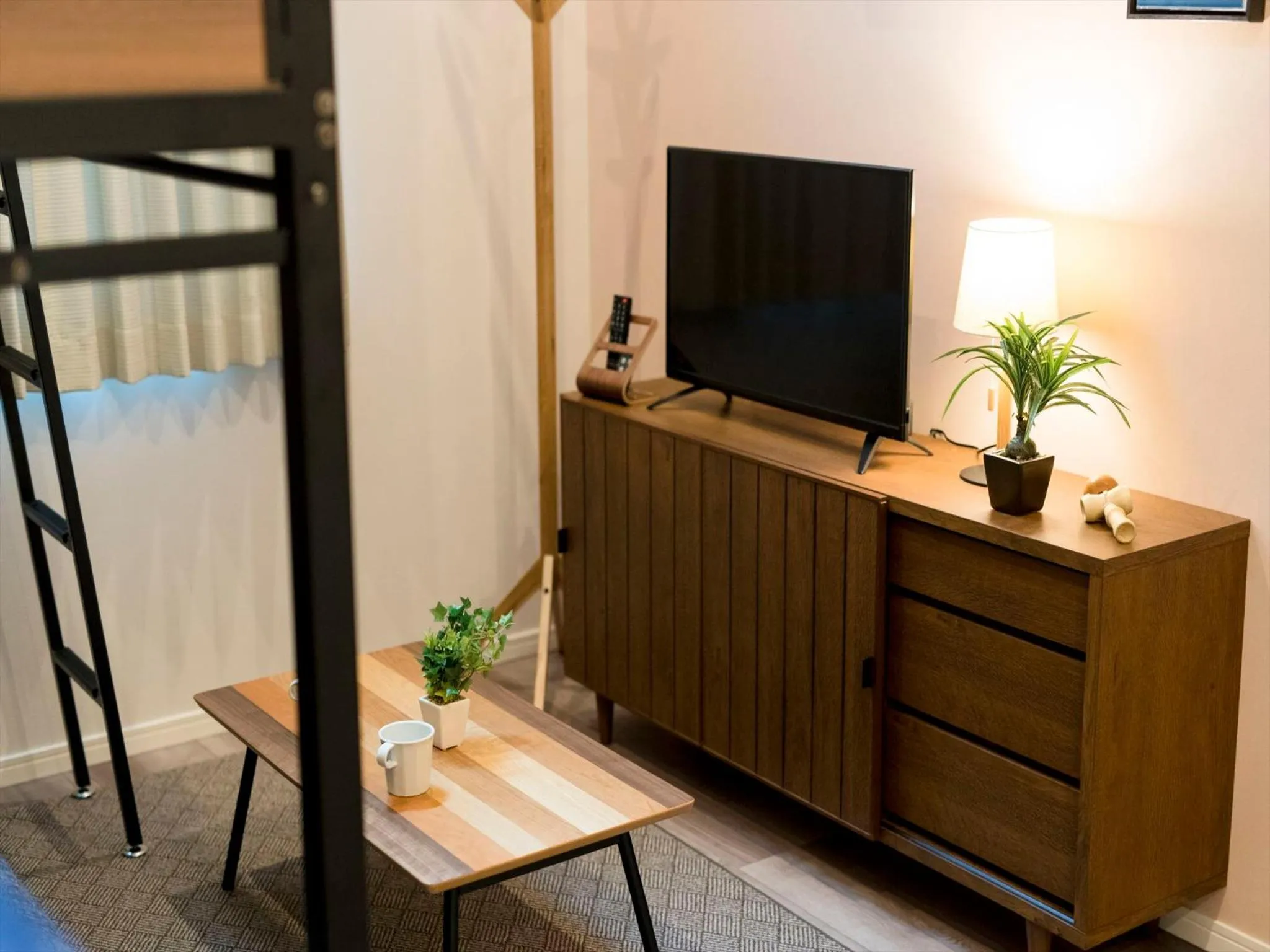 Living room, Bed in TRIP POD TOJIN-MACHI A