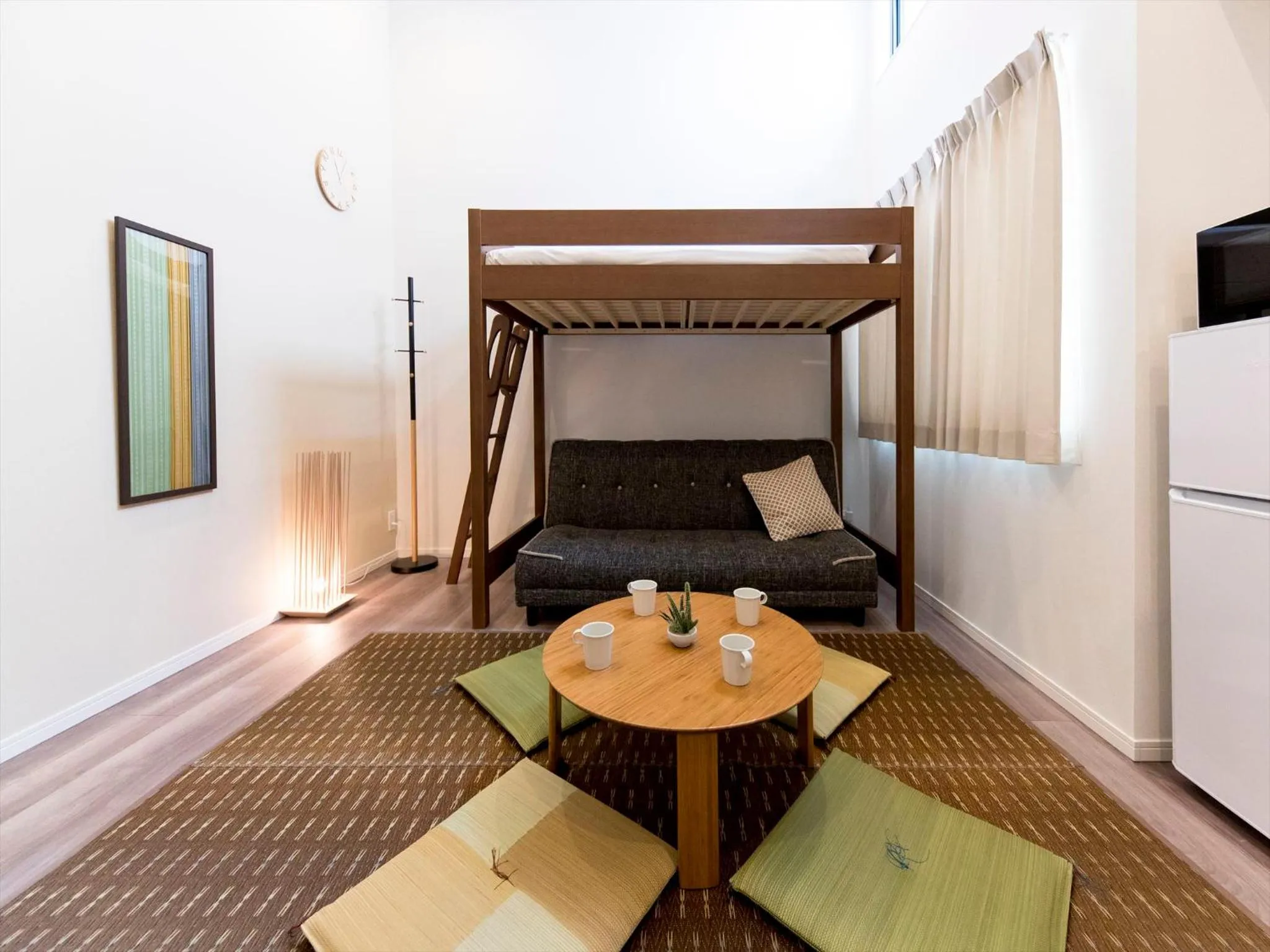 Living room, Bed in TRIP POD TOJIN-MACHI A