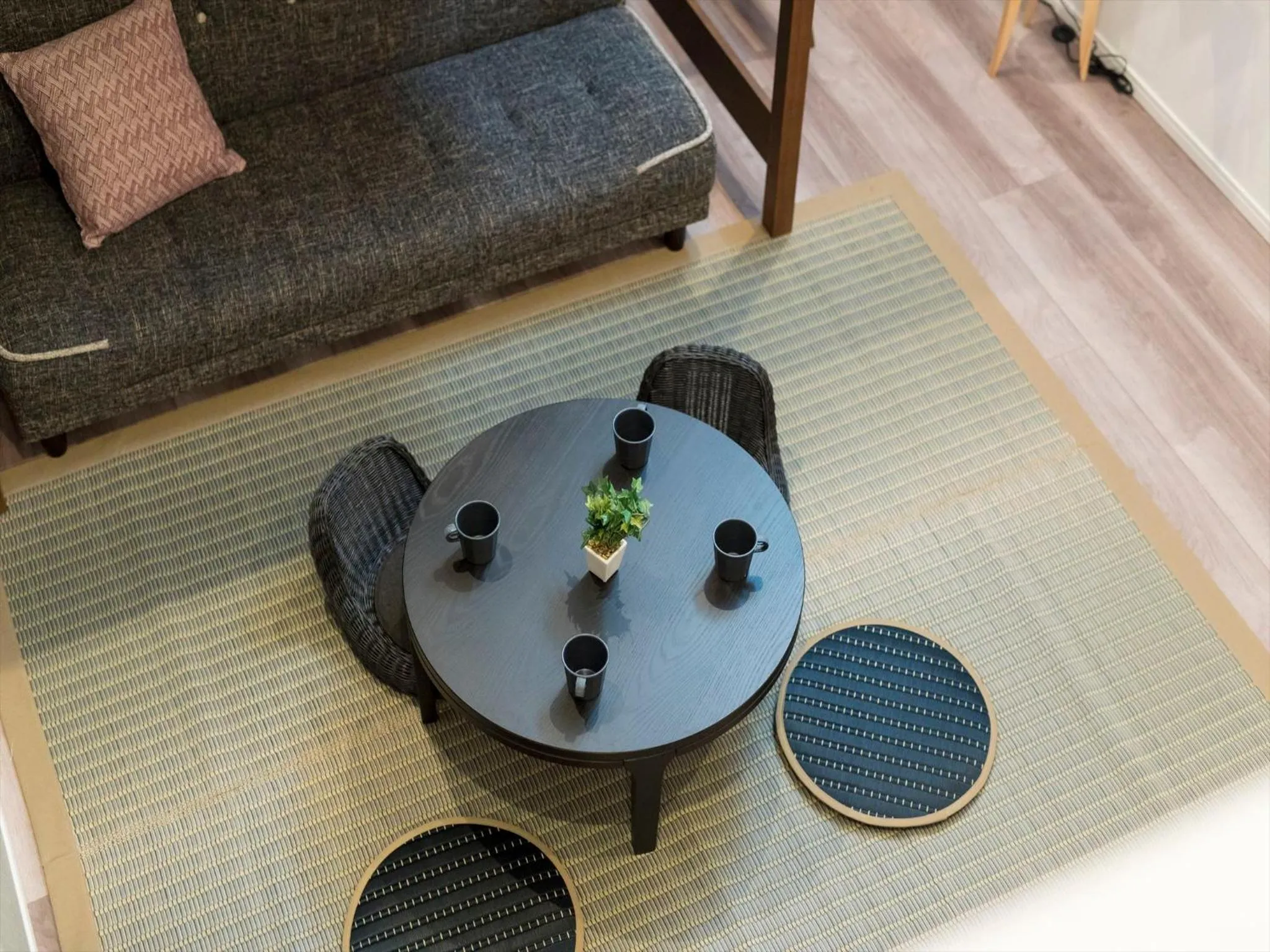 Living room in TRIP POD TOJIN-MACHI A