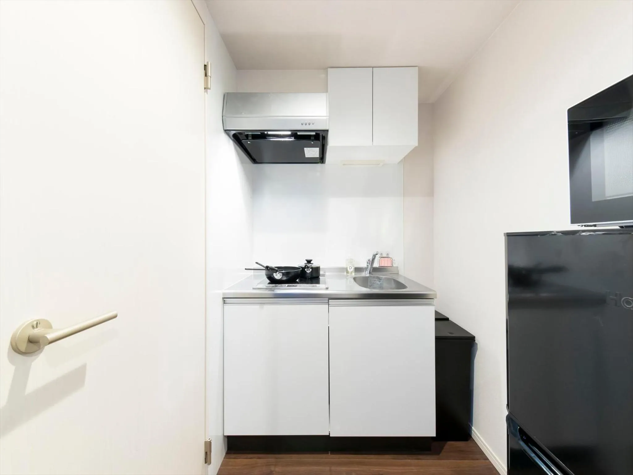 Kitchen or kitchenette in TRIP POD SUMIYOSHI A