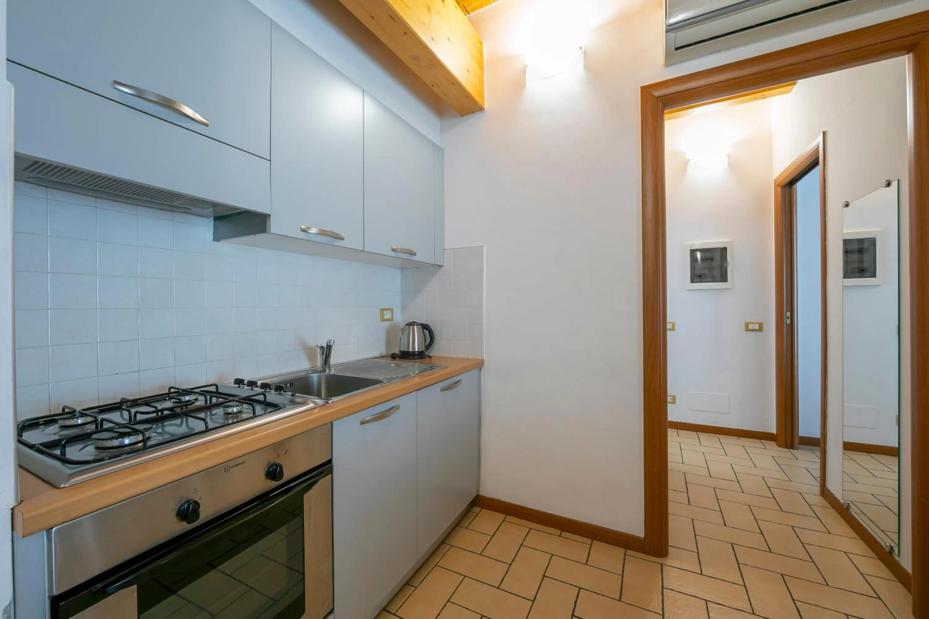 kitchen in Le Stanze del Lago Apartments