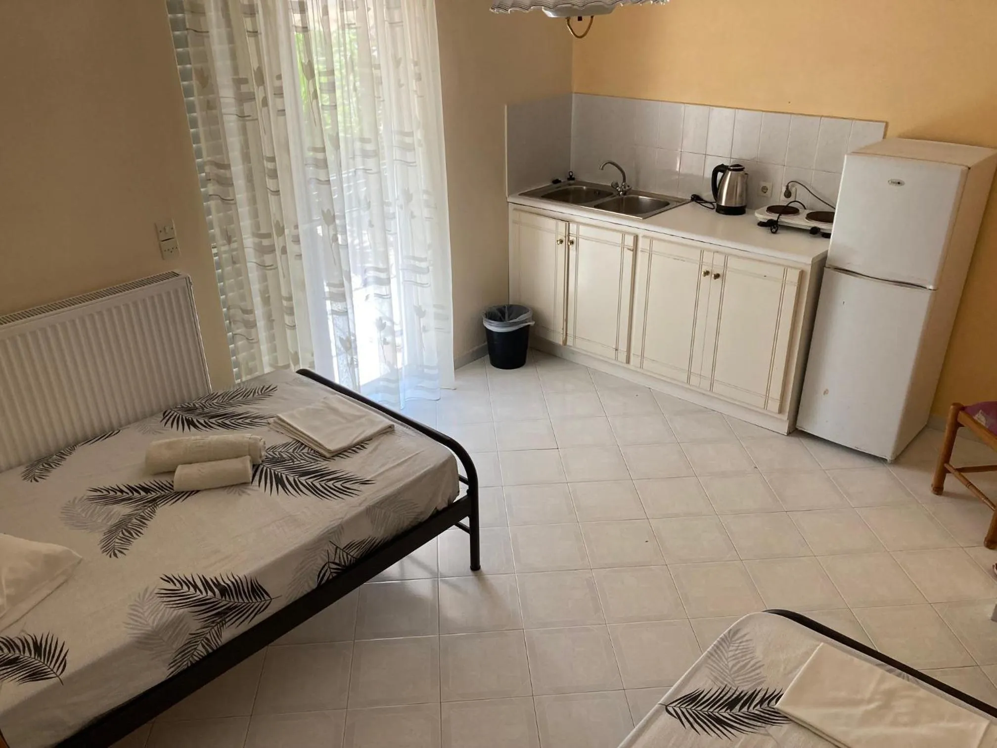 Bed in Polyxenis Rooms