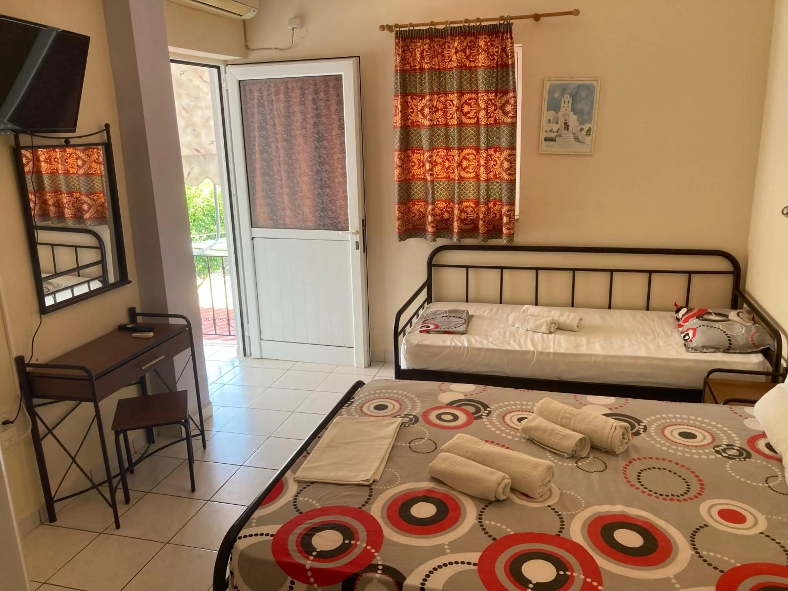 Bed in Polyxenis Rooms