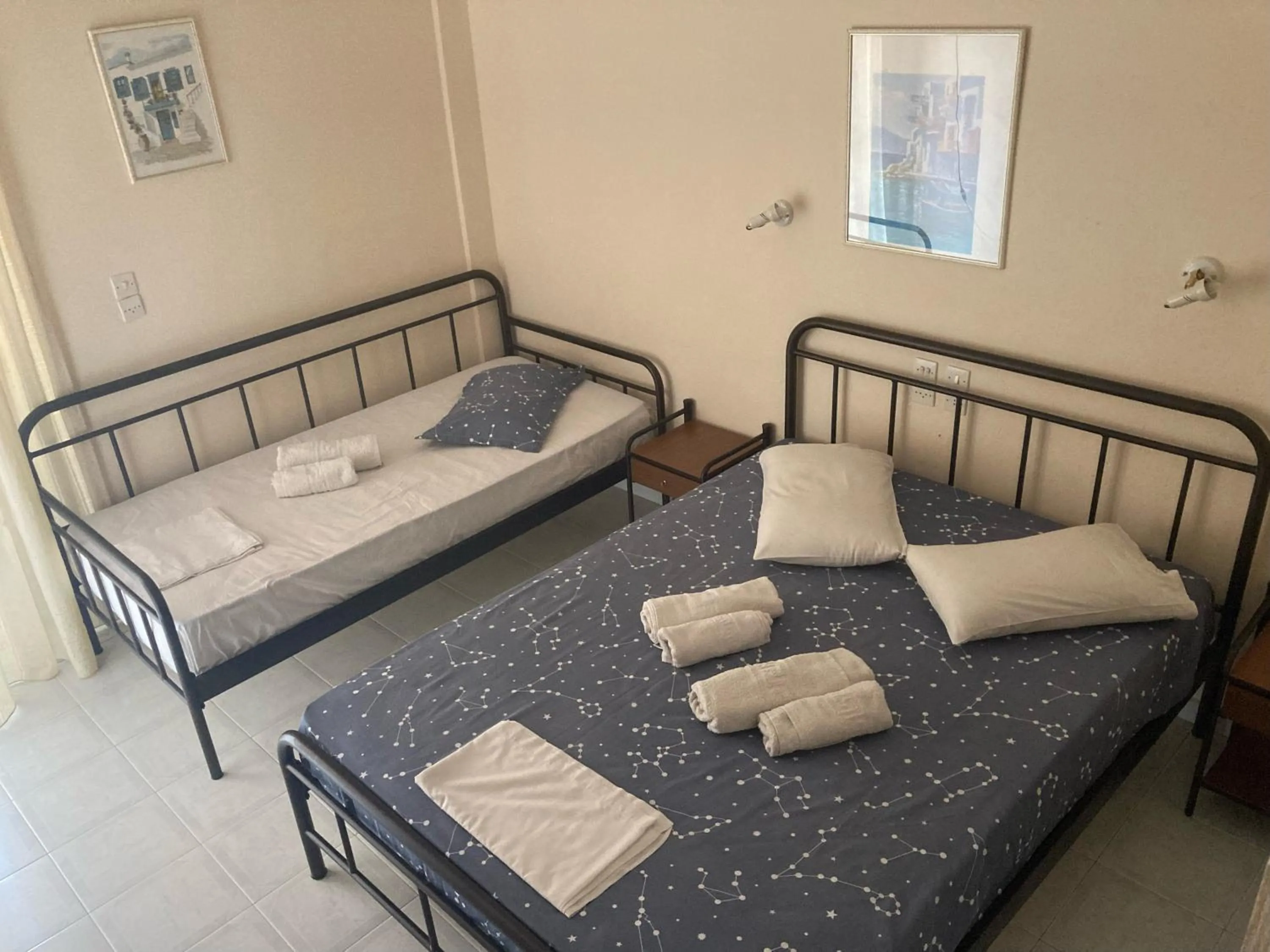 Bed in Polyxenis Rooms