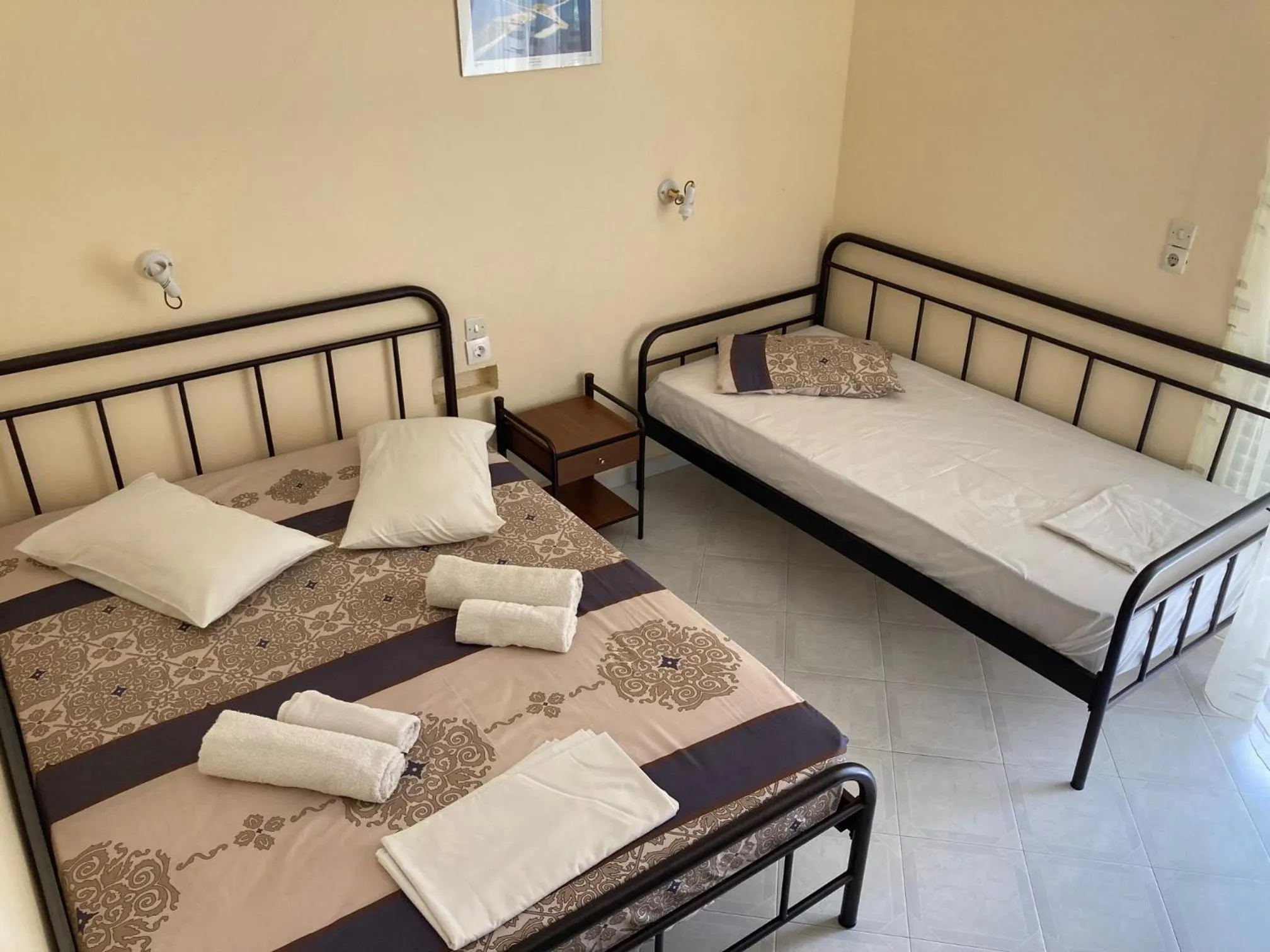 Bed in Polyxenis Rooms