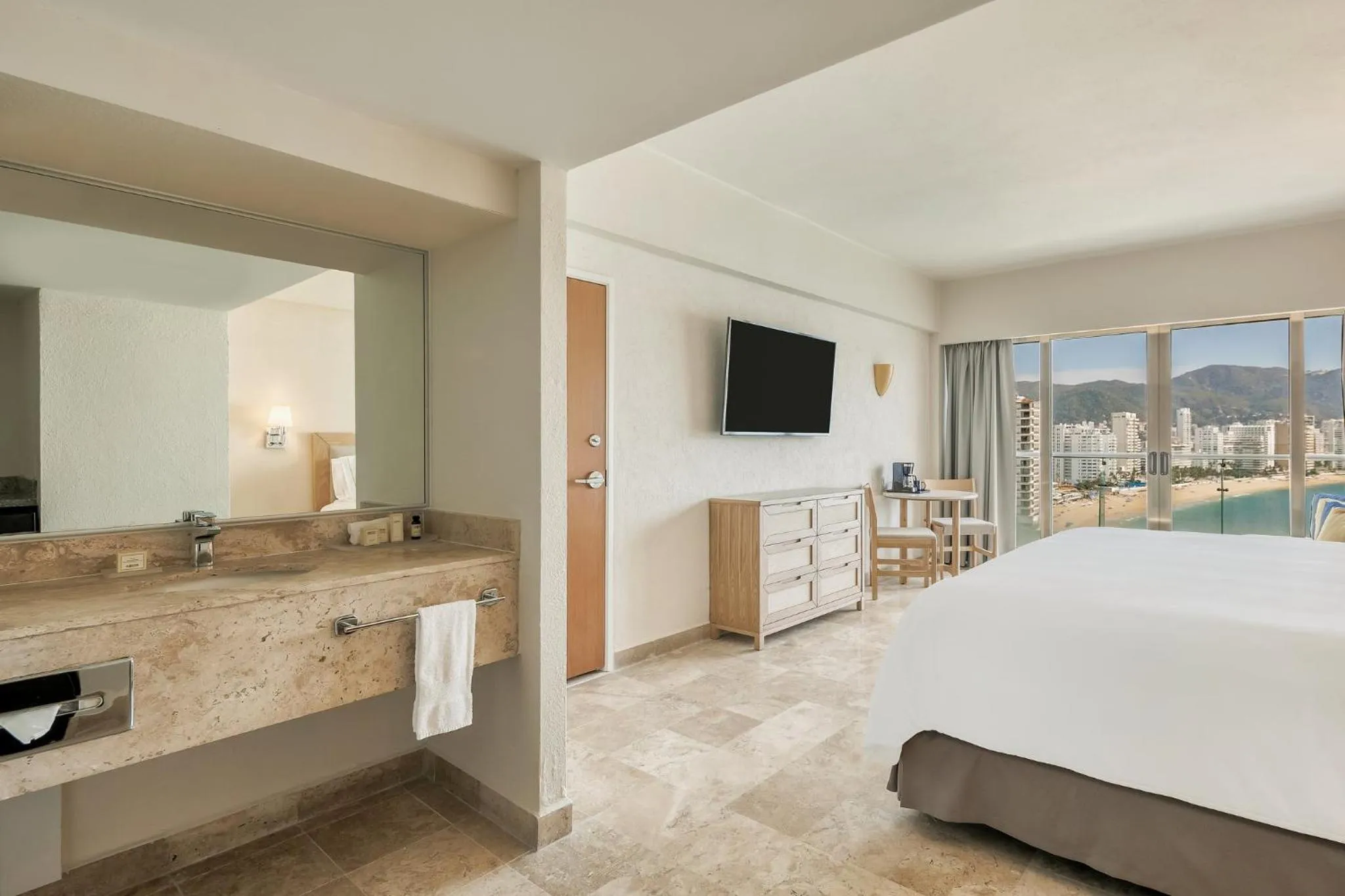 Photo of the whole room, Bed in Fiesta Americana Acapulco Villas