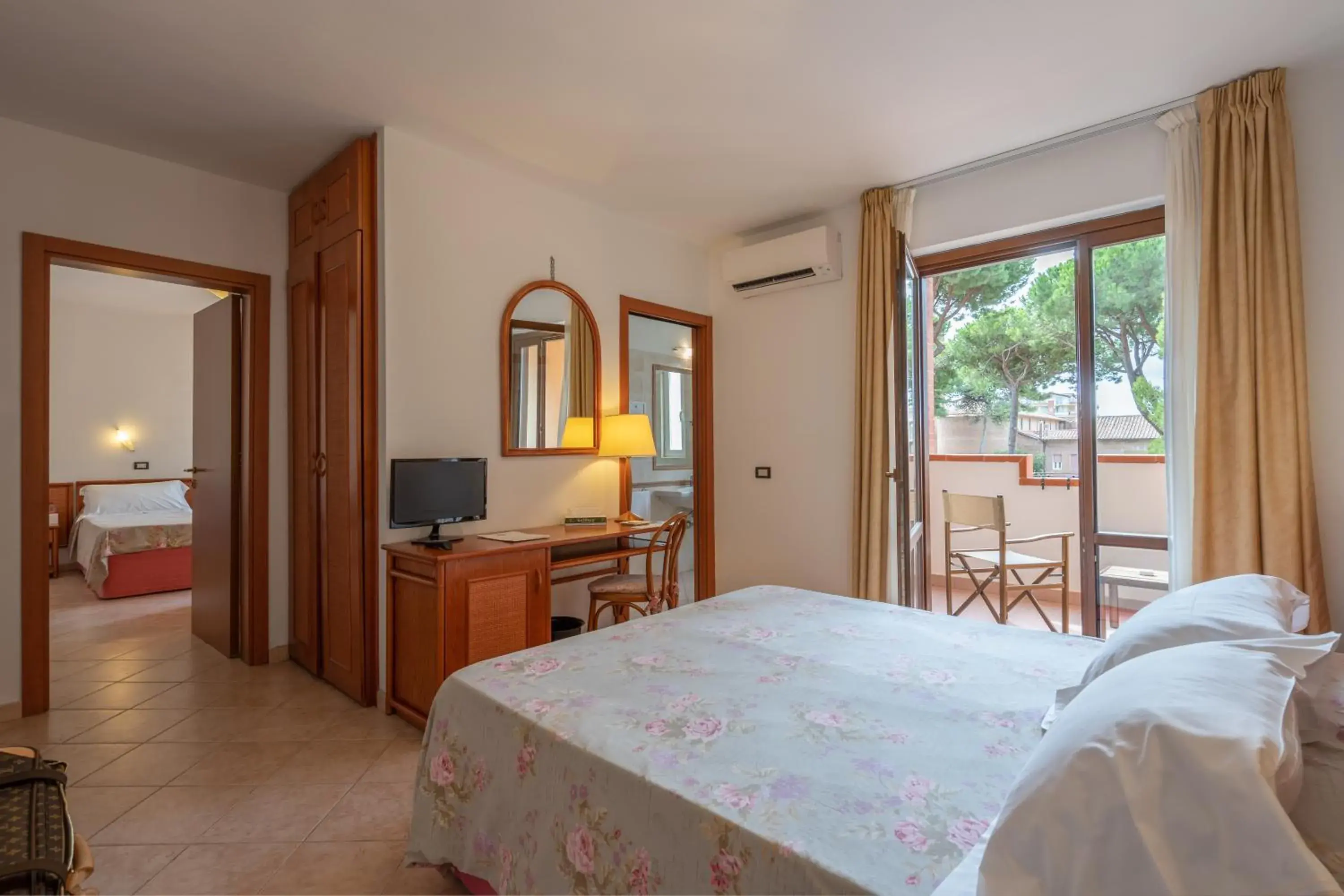Family Room with Garden View in Ricci Hotel - Marina di Grosseto Family Room with Garden View in Ricci Hotel - Marina di Grosseto