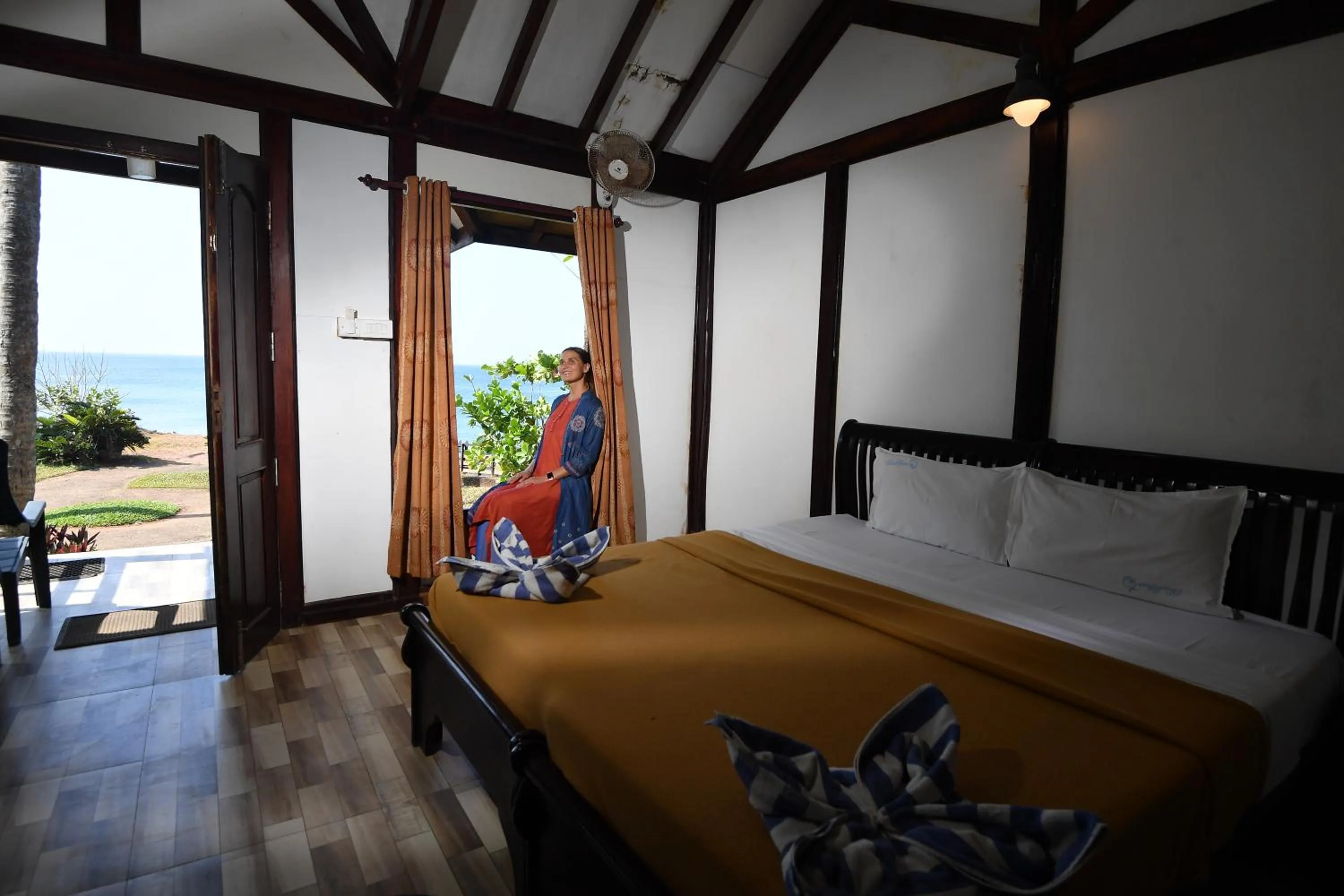 Bed in Blue Water Beach Resort