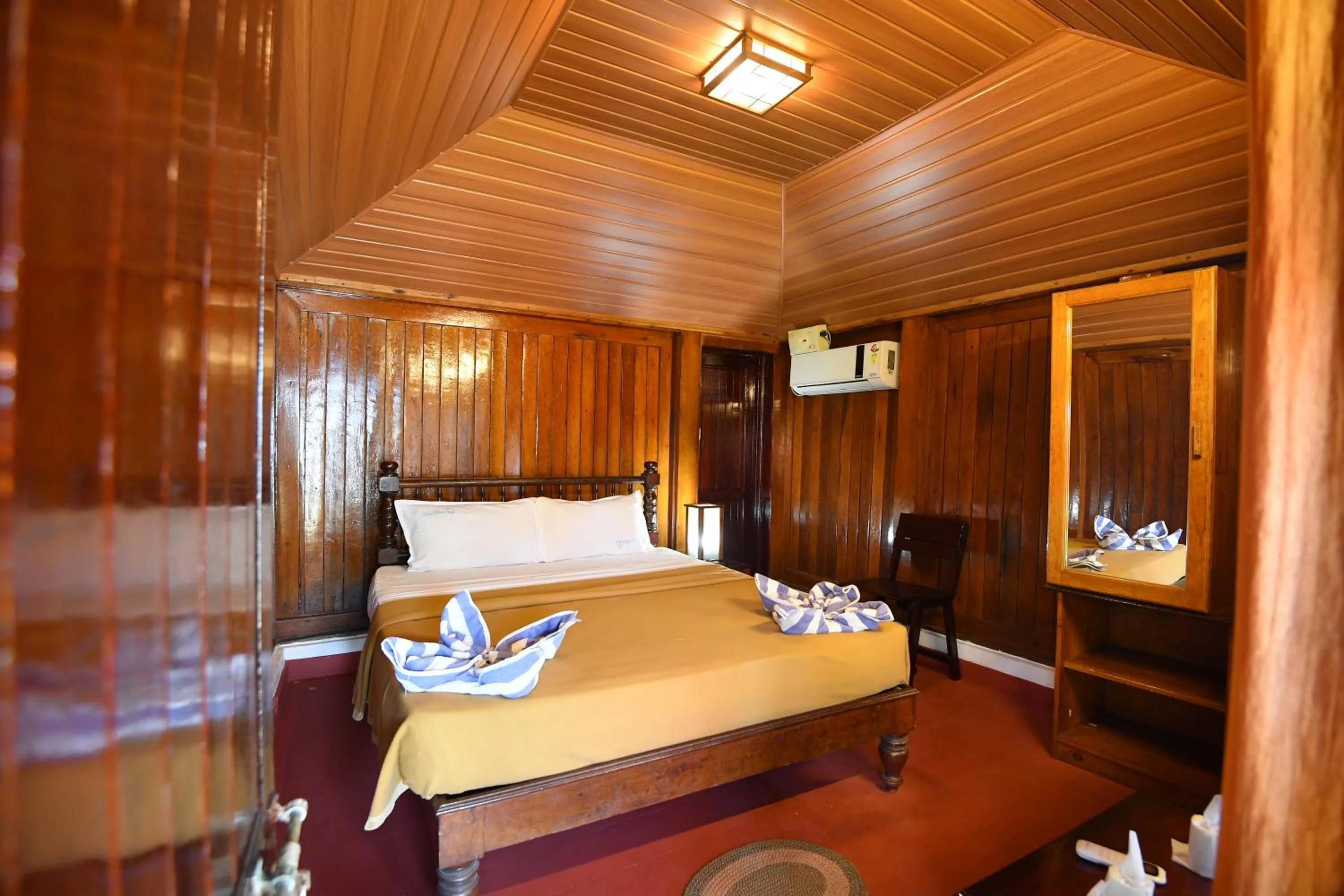 Bed in Blue Water Beach Resort