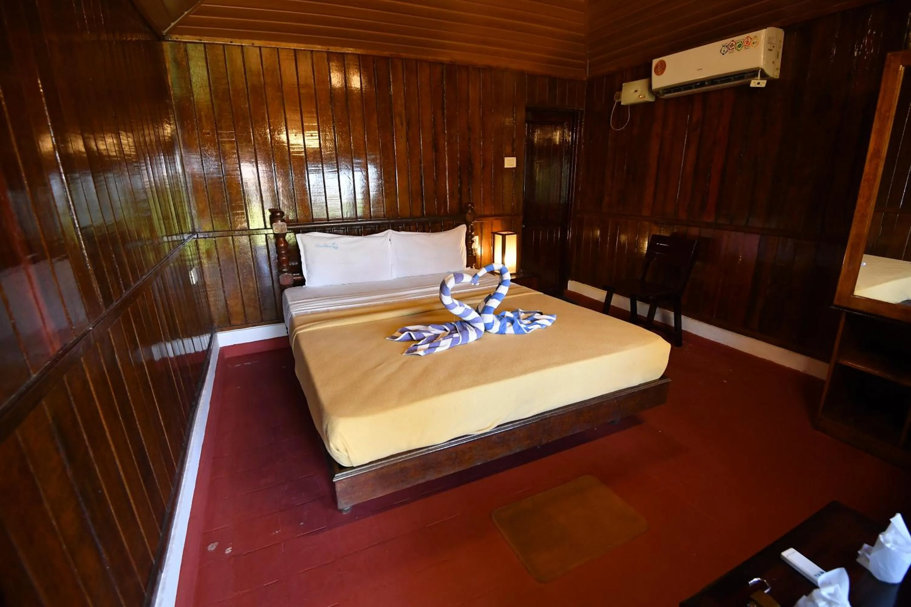 Bed in Blue Water Beach Resort