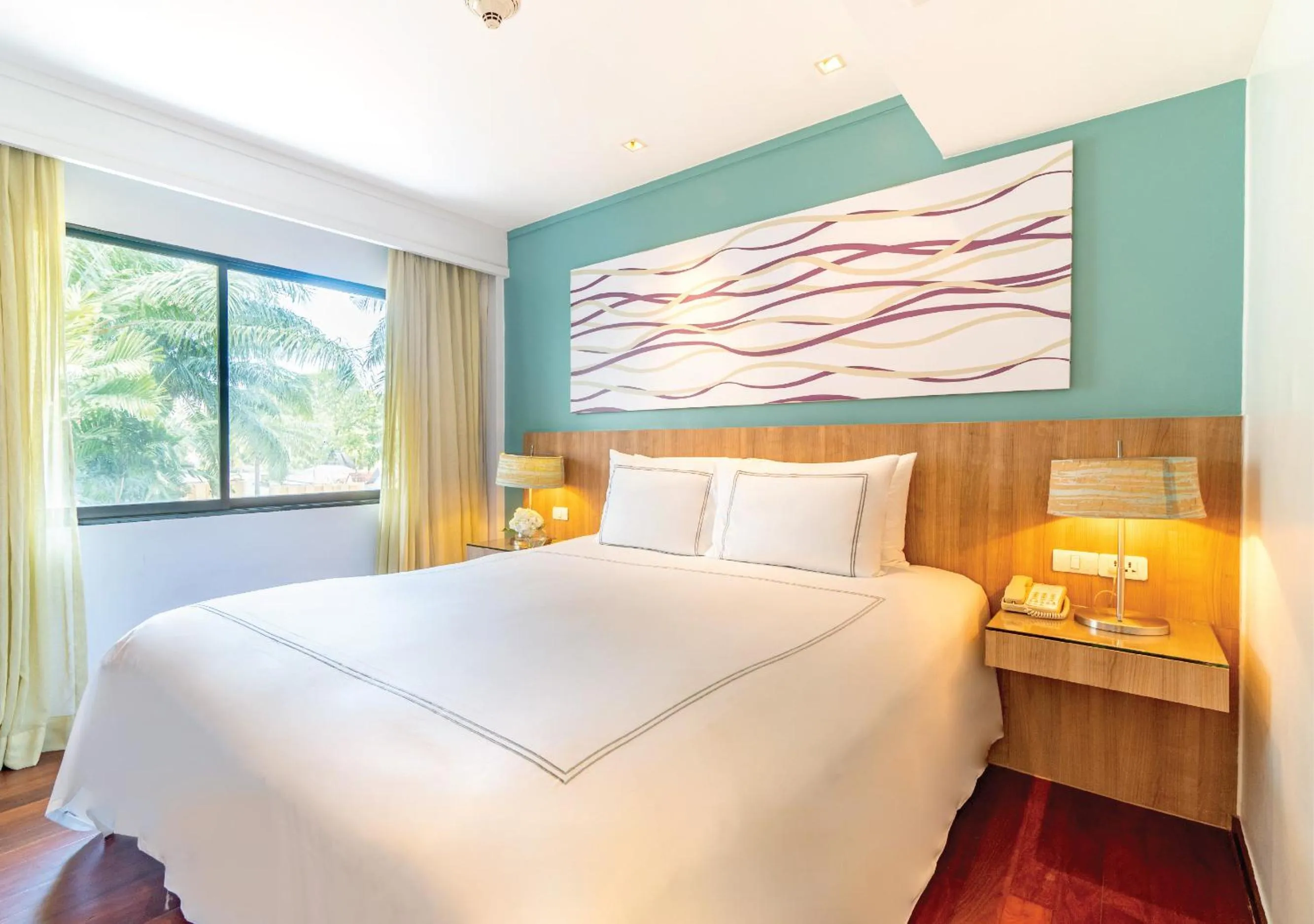 Bed in Radisson Resort and Suites Phuket