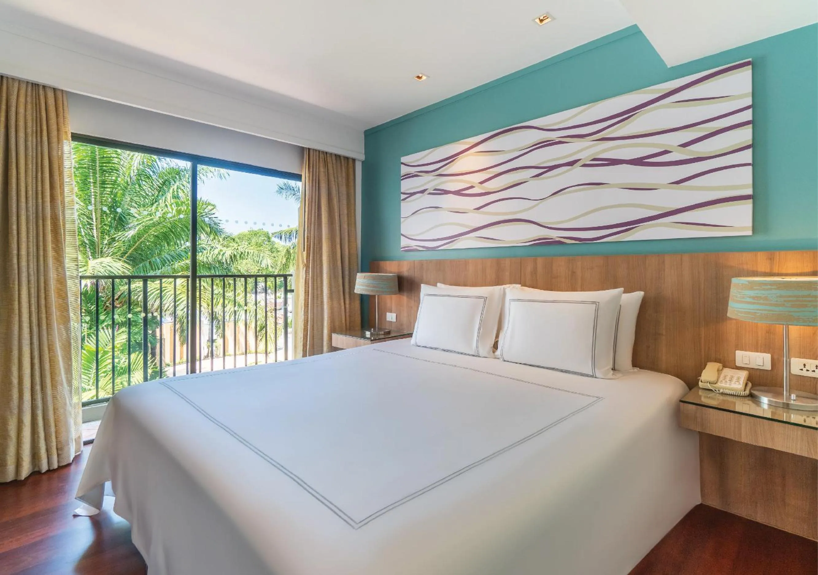 Bed in Radisson Resort and Suites Phuket