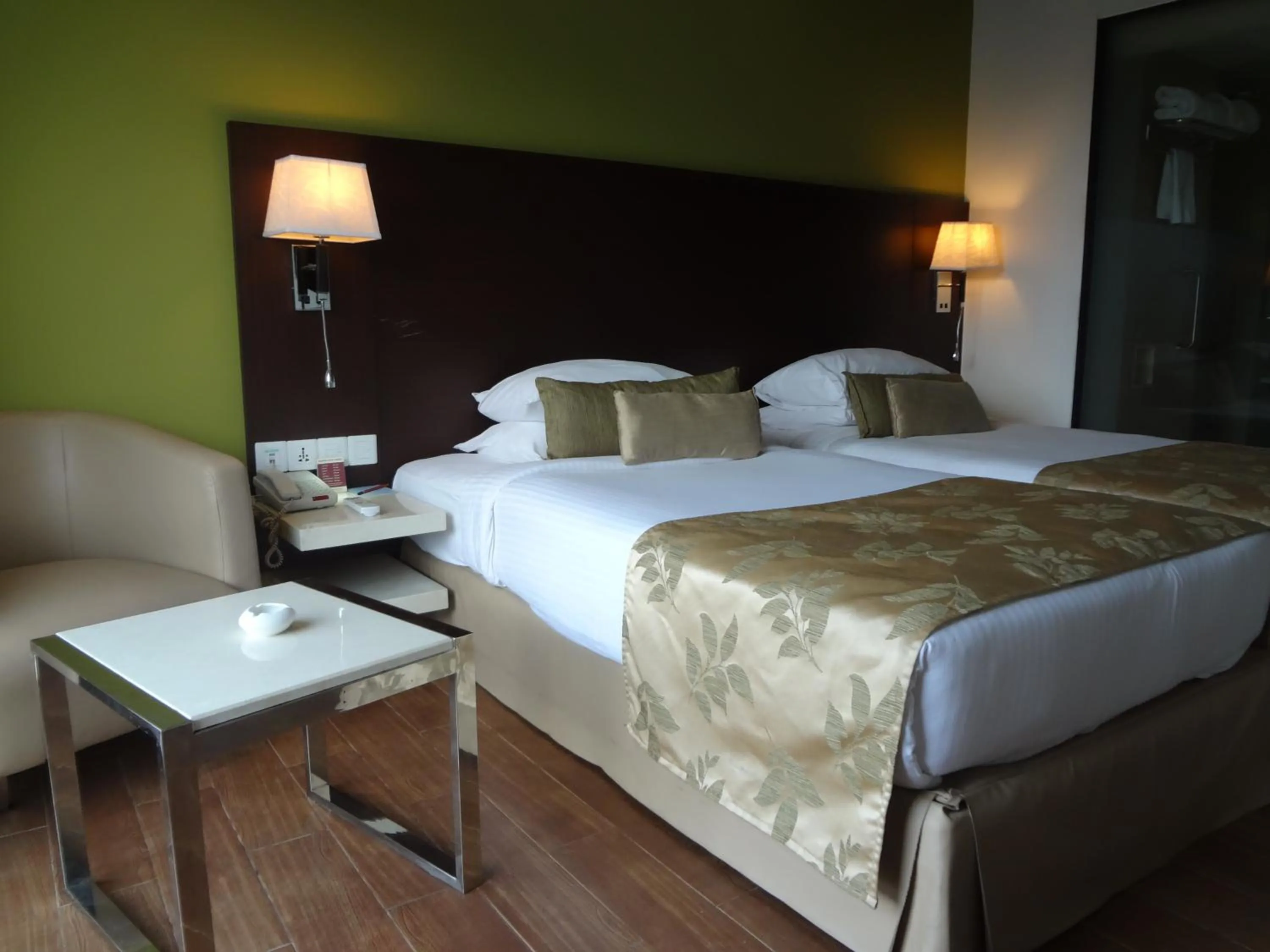 Bed in Ramee Grand Hotel and Spa, Pune