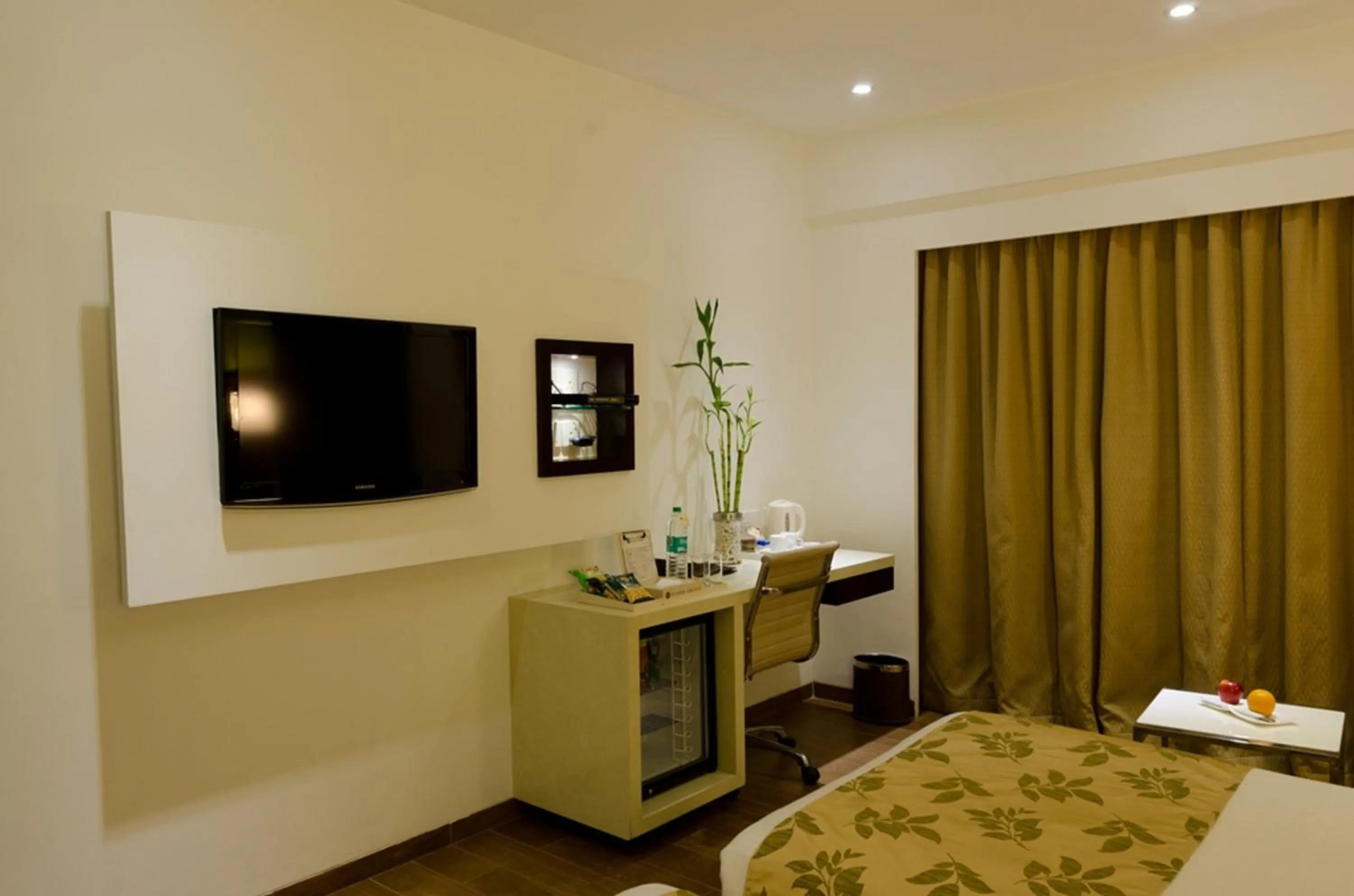 Bedroom, Bed in Ramee Grand Hotel and Spa, Pune